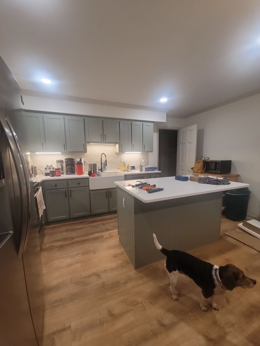 A Pathway to Personality – A Two-Tone Kitchen Transformation in Apex by Elite Remodeling and Design LLC