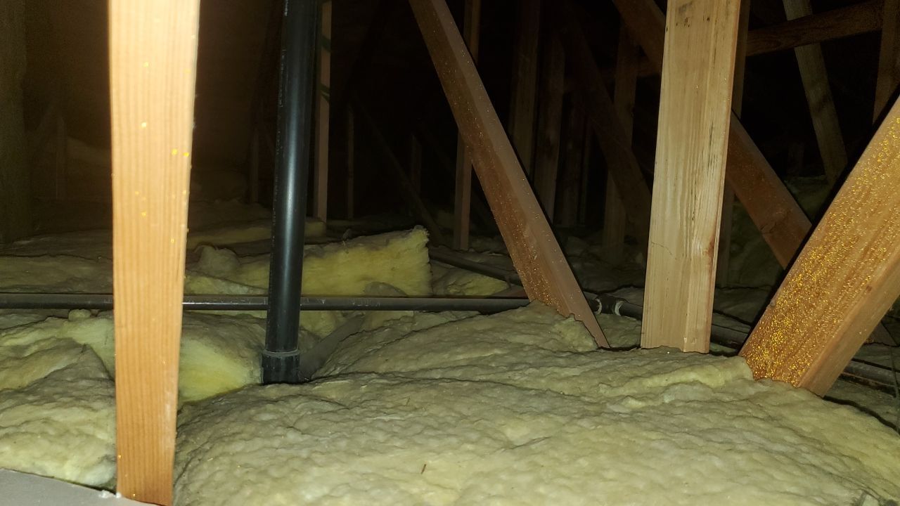 Attic Insulation, Roofing, and Solar for this in-town home by Byers Enterprises 