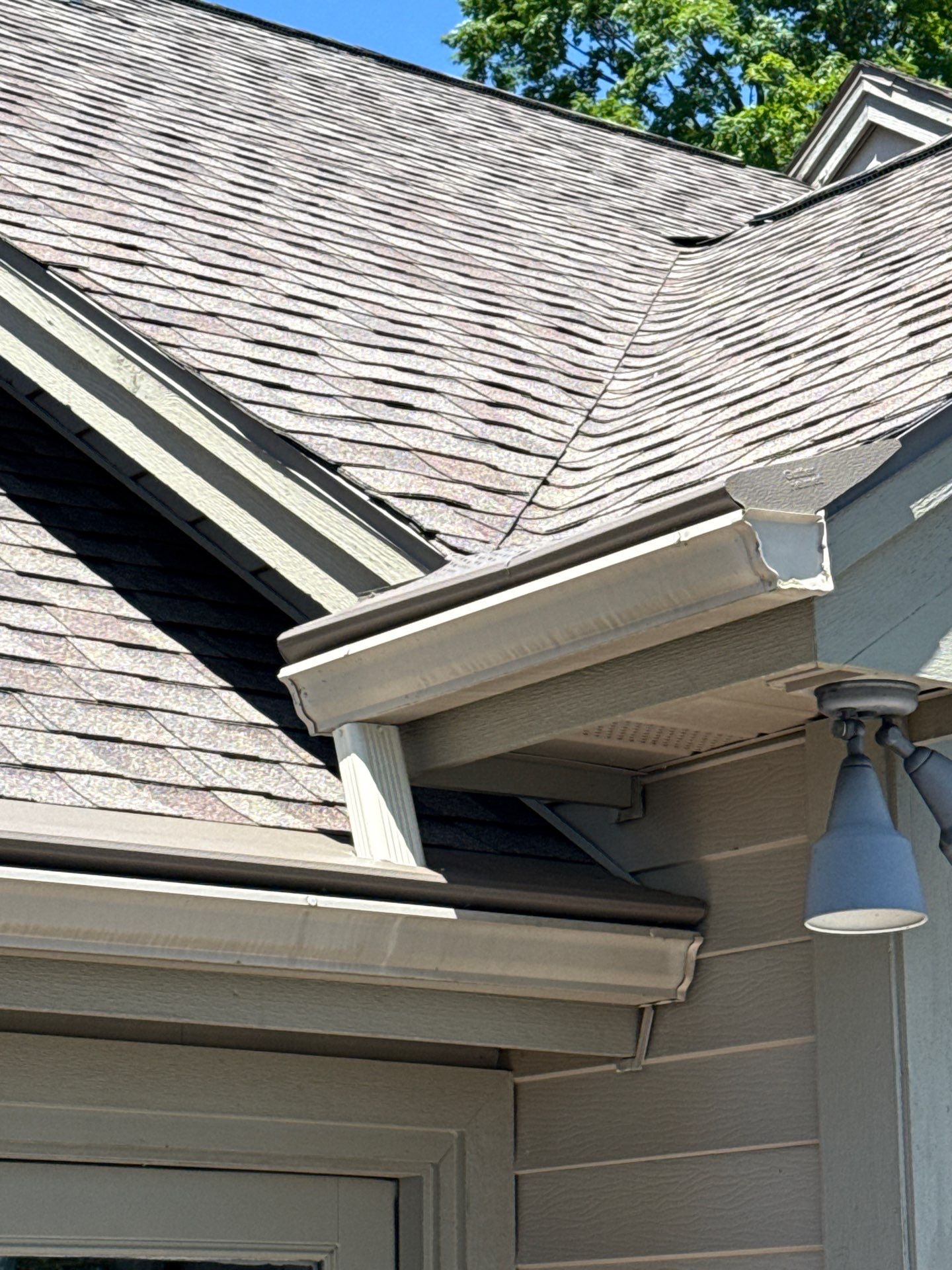 Custom Gutter Helmet Protection for Residential Roof in Suttons Bay by Rainbow Seamless Systems