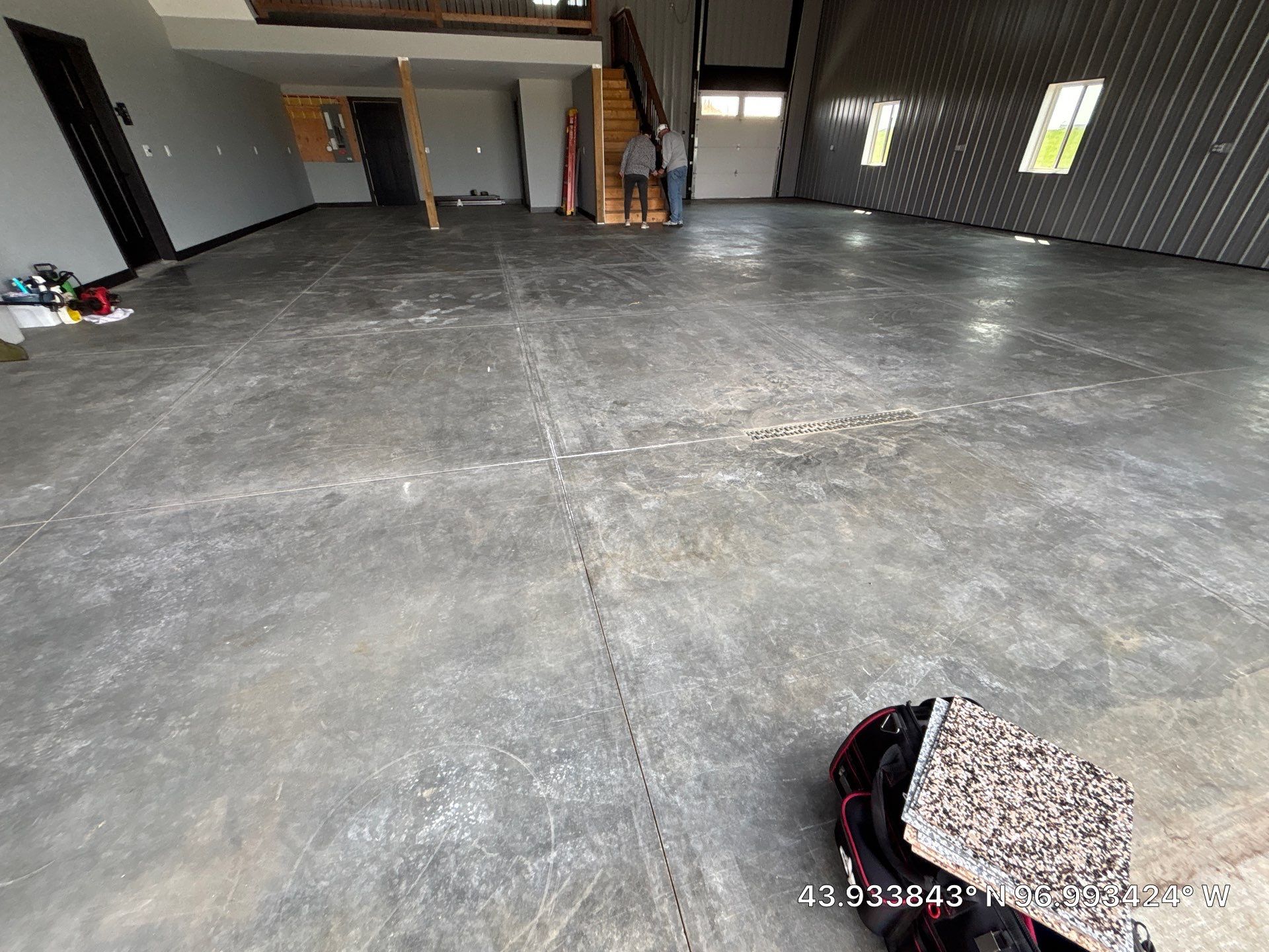 Polyaspartic Garage Floor Coating with Decorative Flake in Wentworth by Select Painting, Coatings & Garage Cabinets