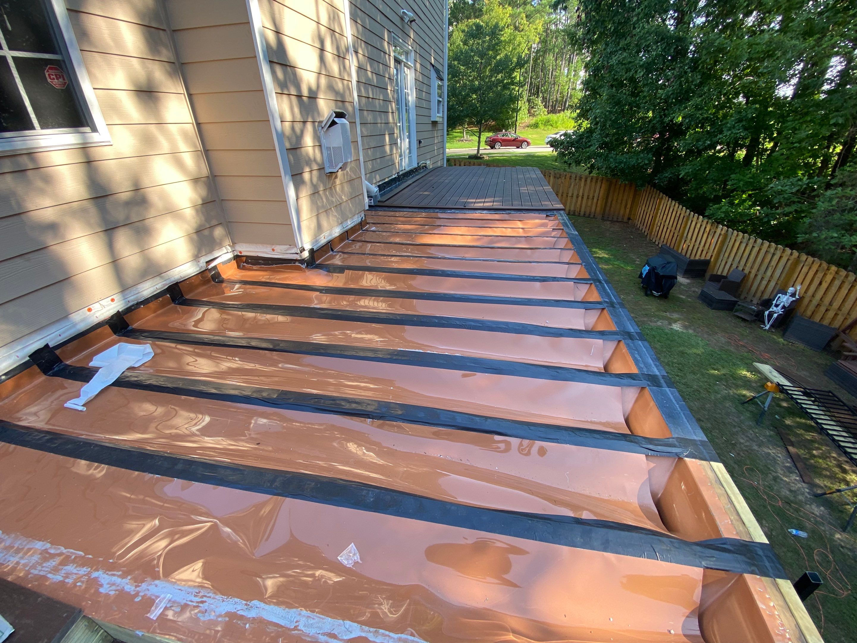 Trex Decking, Aluminum Railing, Rain Escape Underdecking by The Remodeling Company