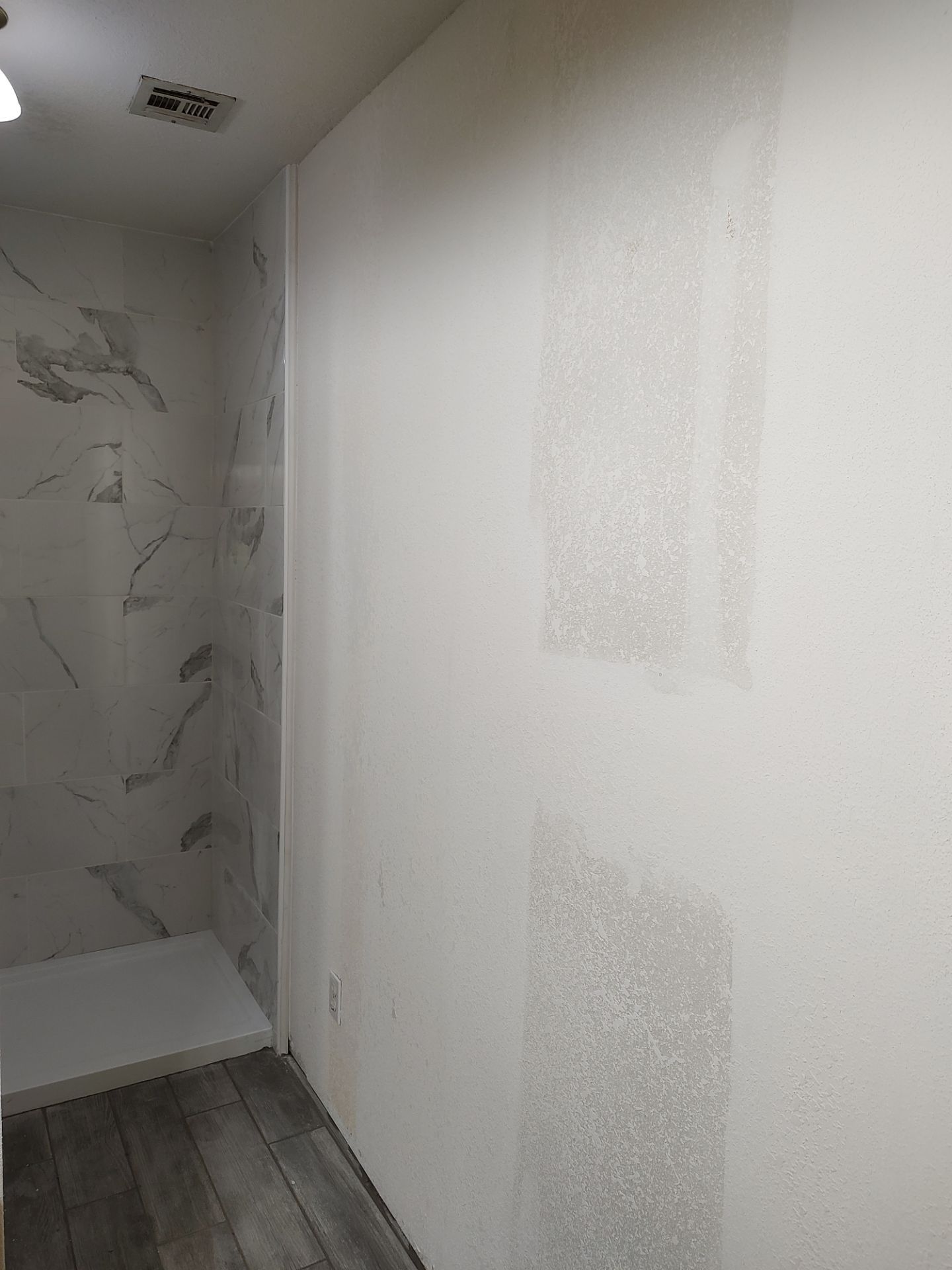 Bathroom remodel w/shower upgrade by In & Out Construction & Remodeling, LLC
