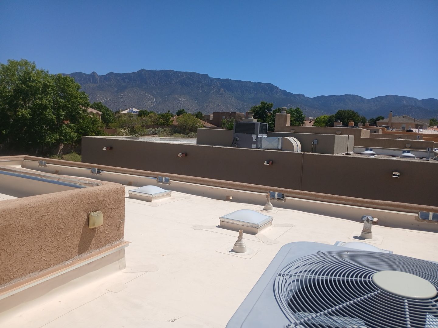 Albuquerque TPO Roof Replacement with Rigid Insulation and Skylights by Doyle Roof Masters Inc