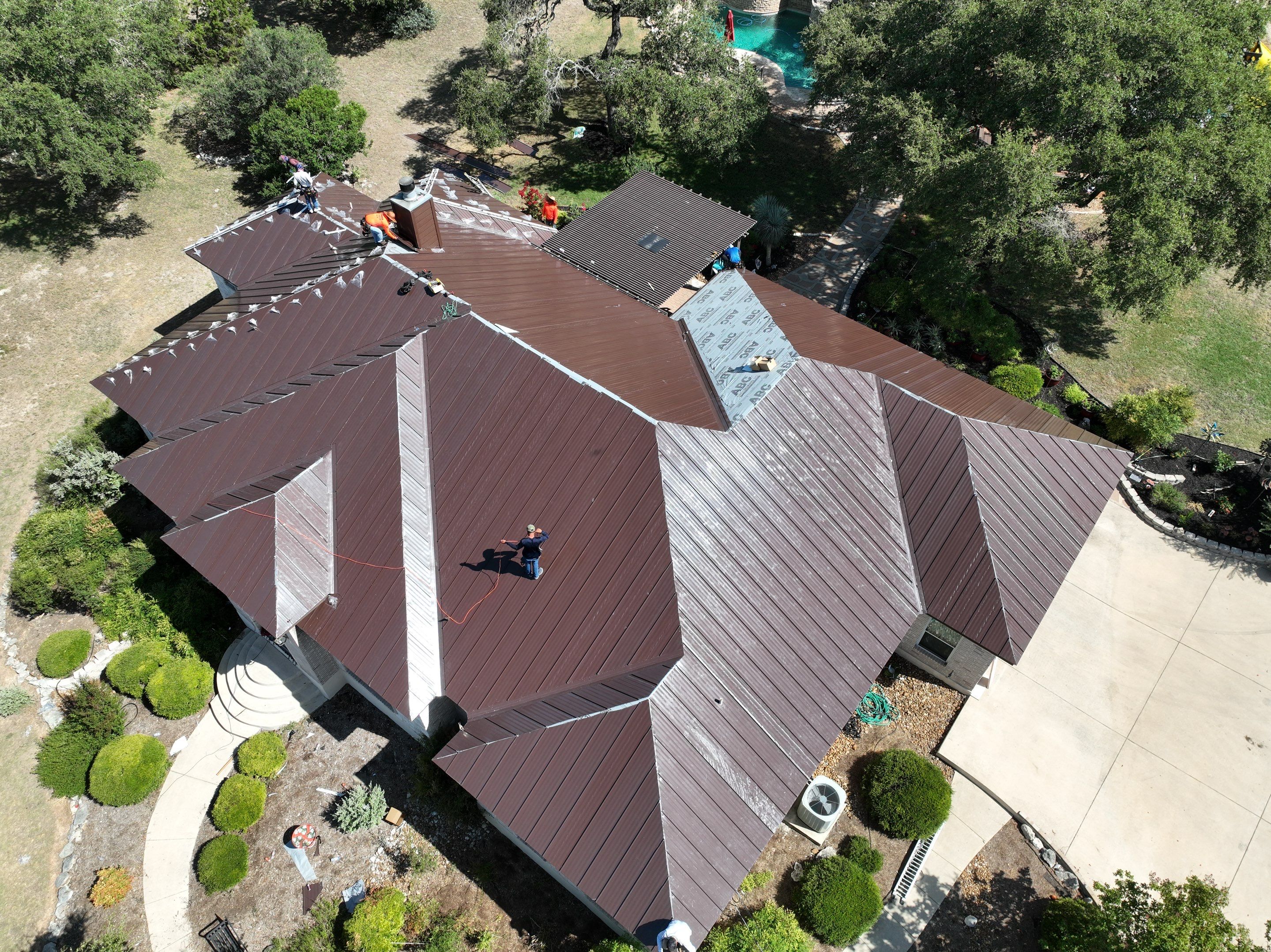 Residential Metal Roof Installation using McElroy Metal by Premier Roofing and Contracting