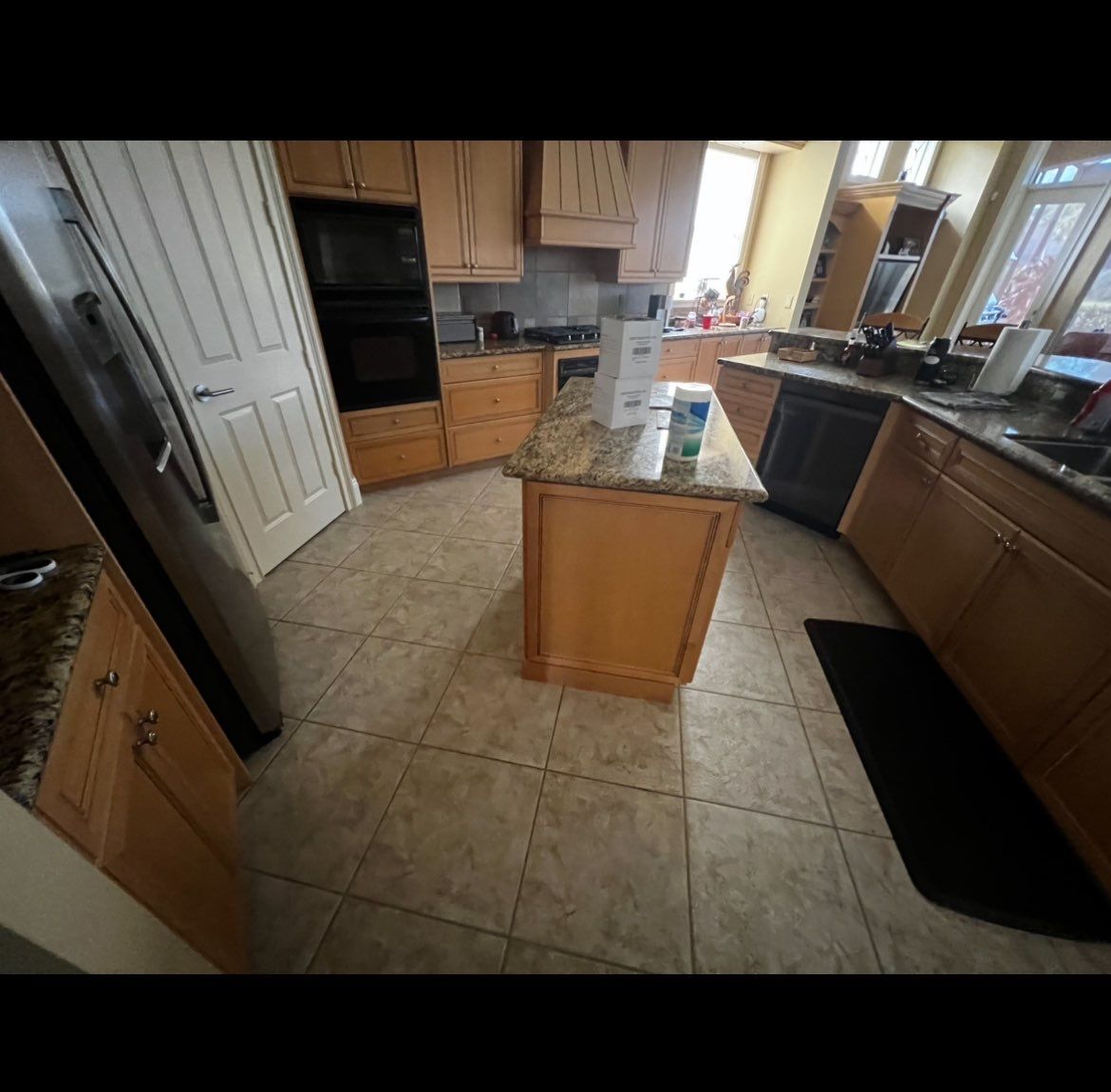 Wood Look Tile  using Alpi Tortora 8x48 by Naples Flooring Boutique