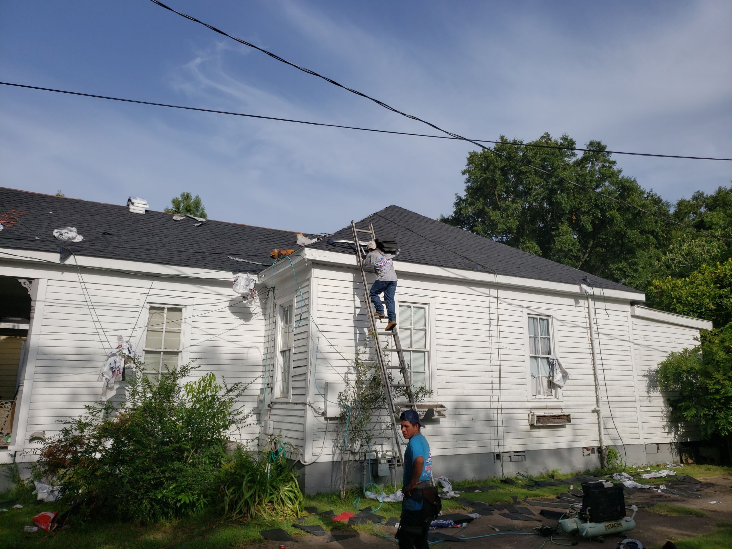 Residential Roofing Installation using Roof Replacement by American Roofing & Construction LLC