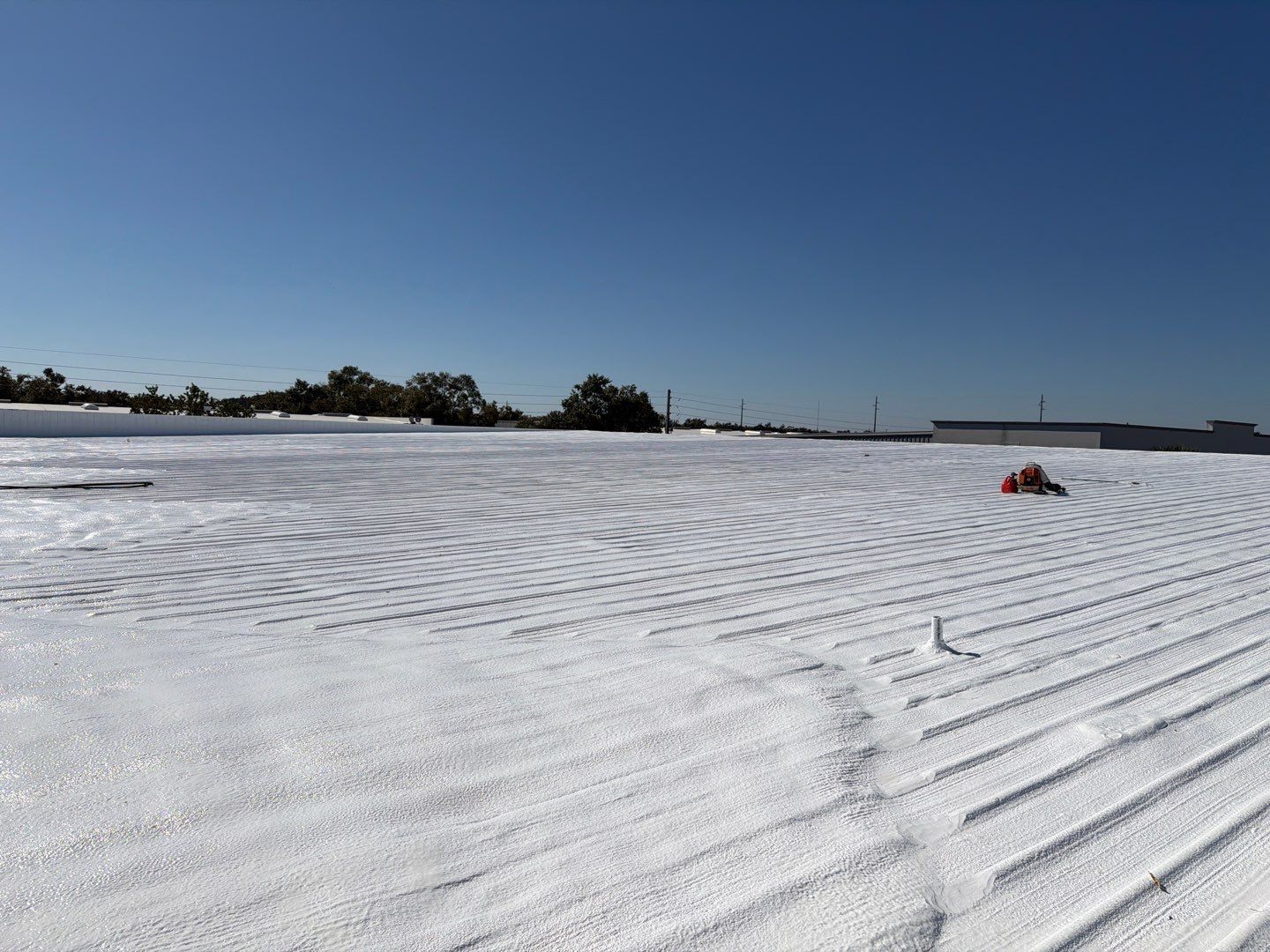 Orlando Commercial Metal Roof Restoration and Silicone Coating System by CES Roofing