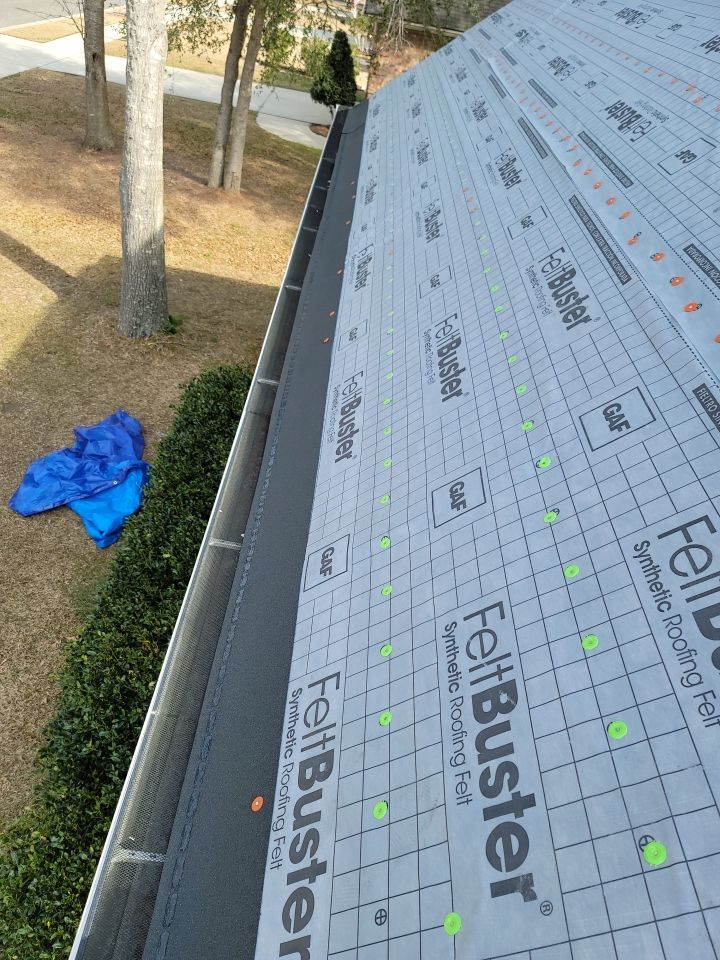 Residential Roofing Installation using Roof Replacement by American Roofing & Construction LLC
