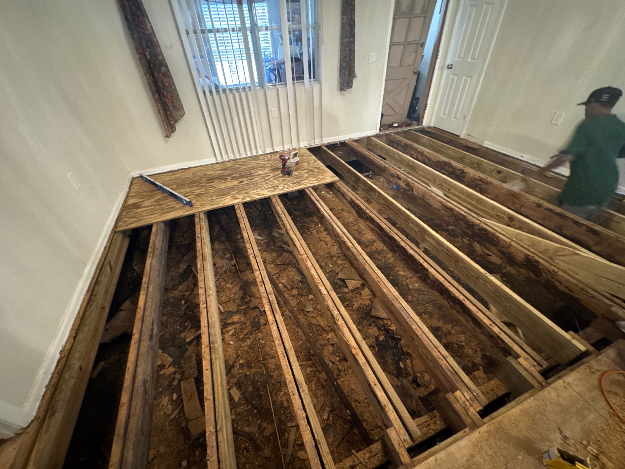 Subfloor Repairs & Flooring Installation by Axtra Hand