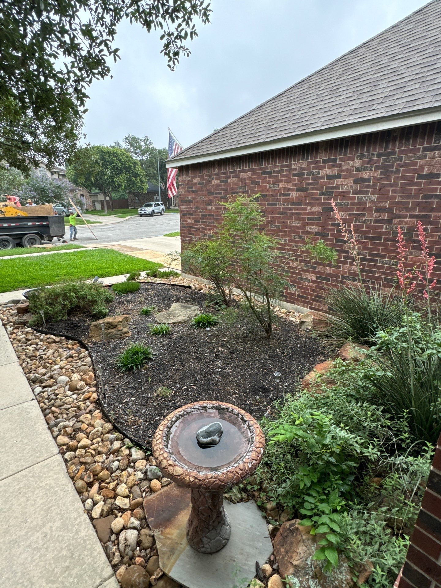 Landscaping Enhancement  using Texas Black Gravel by Hole In One Lawns, LLC