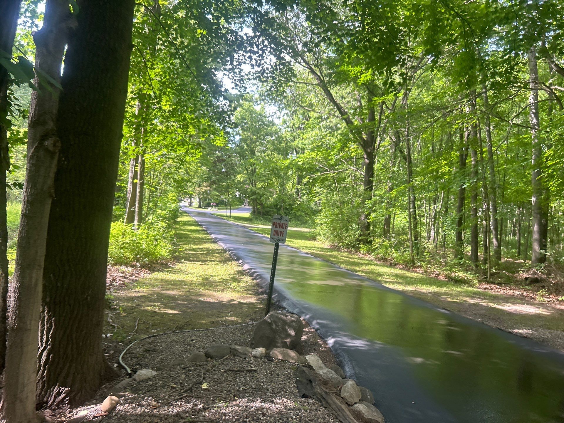 High end residential driveway by Quality Asphalt & Maintenance LLC