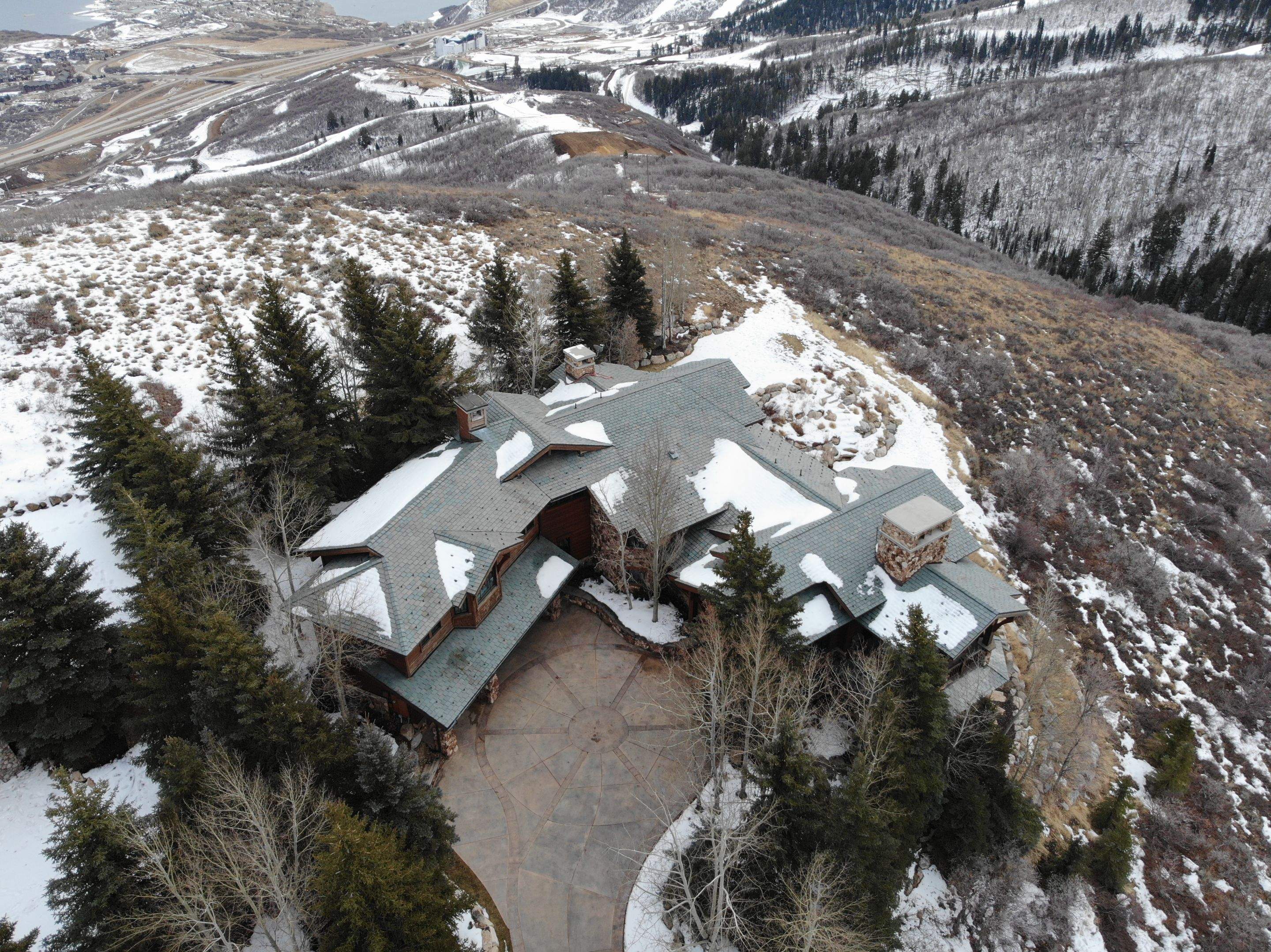 Standing Seam Metal Roof Replacement After Snow Damage by ASAP Roofing & Restoration