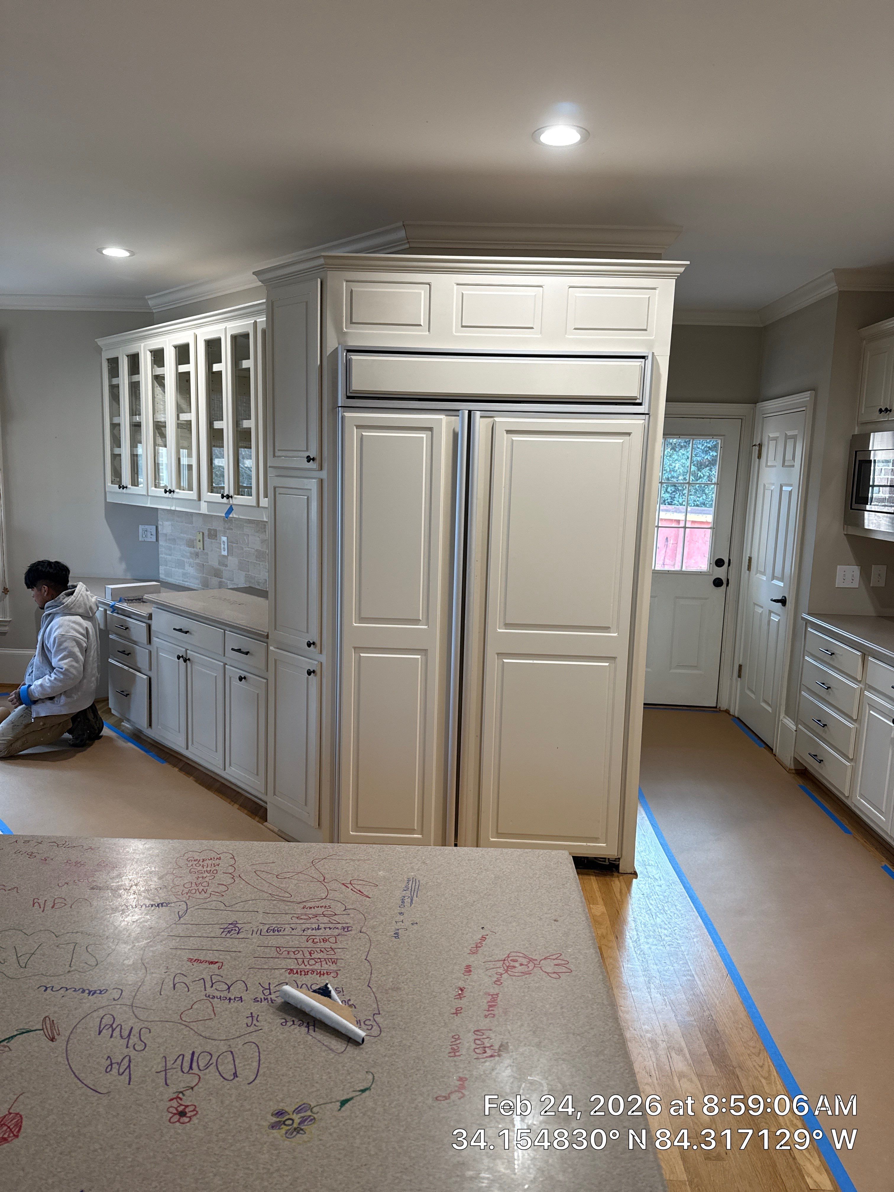 Alpharetta Kitchen Remodel Featuring Double Islands and White Quartz by Heart & Home Kitchen & Bath Remodeling LLC