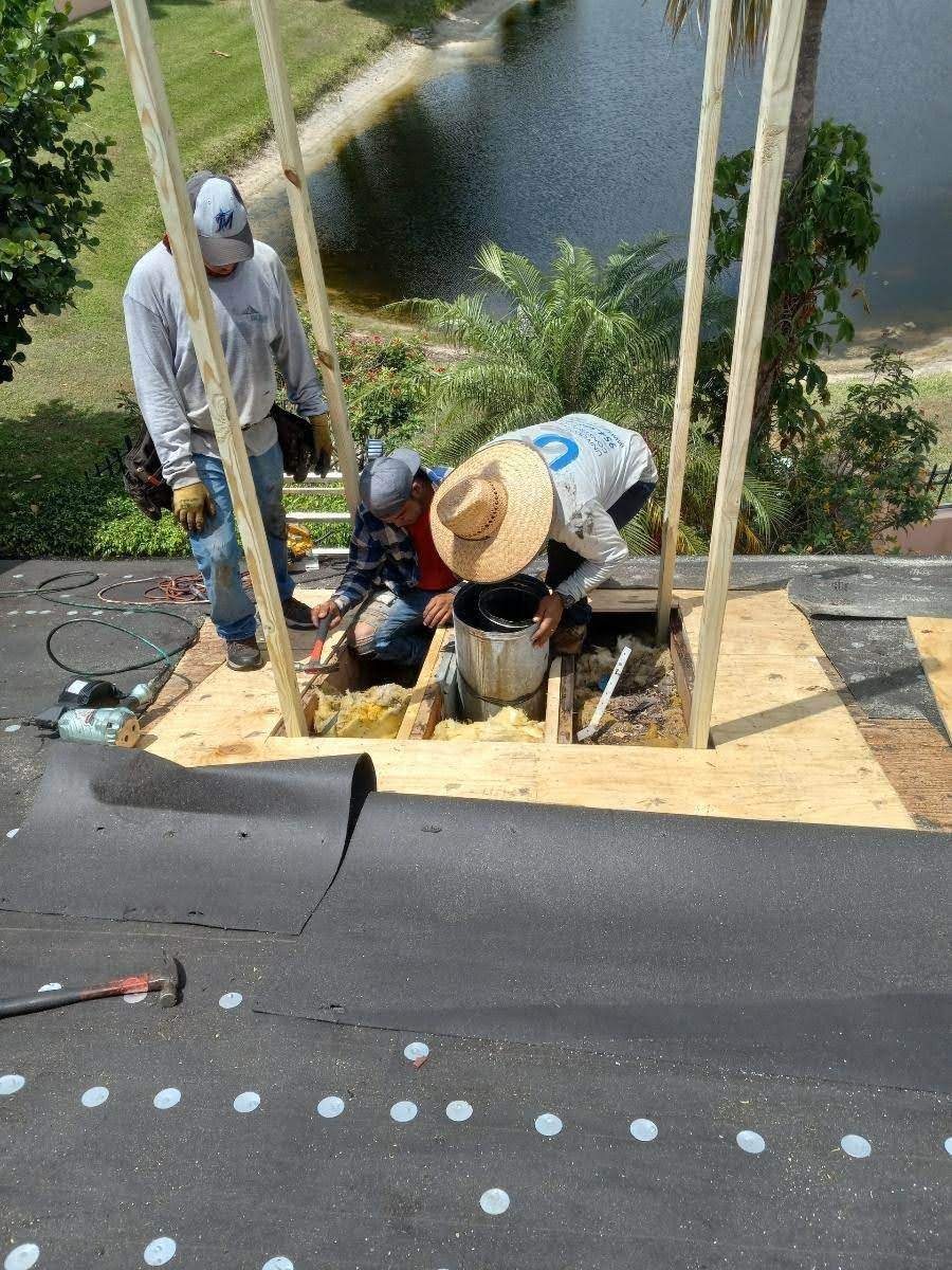 Complete Chimney Rebuild + Tile & Flat Re-Roof  by Morton Roofing, Inc.