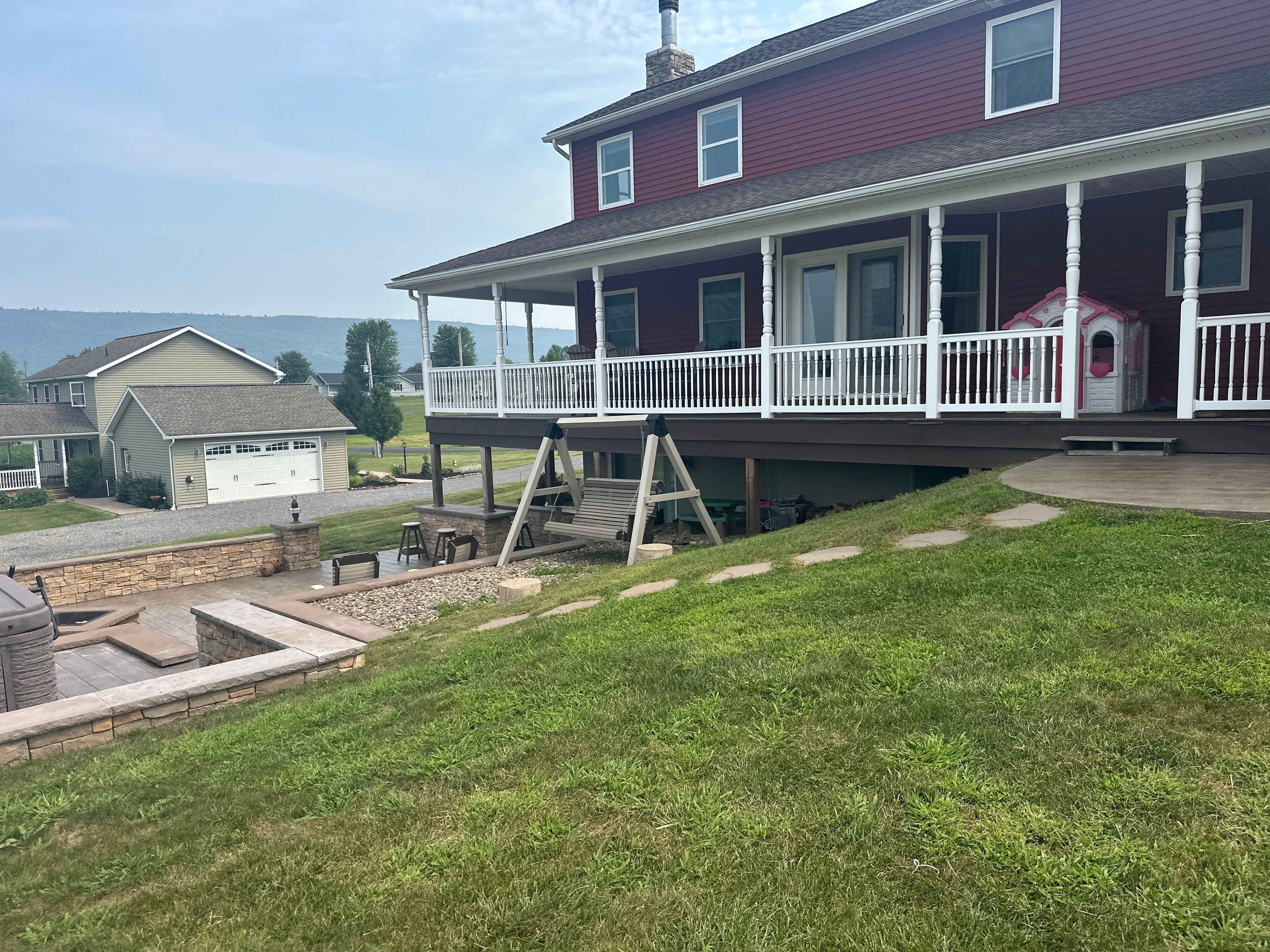 Covered Deck Addition With Custom Gable Roof in Tower City by Esh Builders