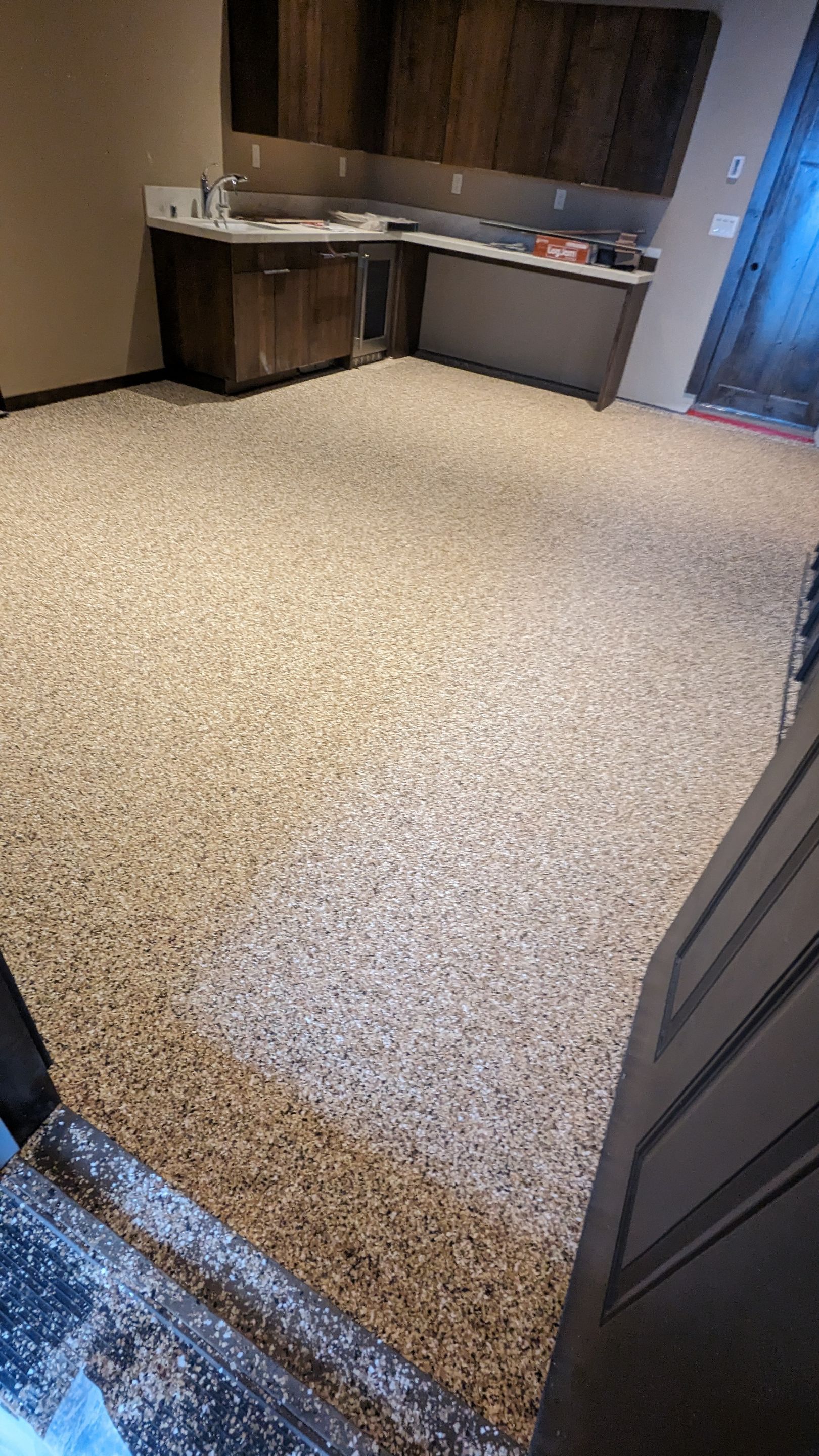 Shop Transformation using Sandstone by Croc Coatings, LLC