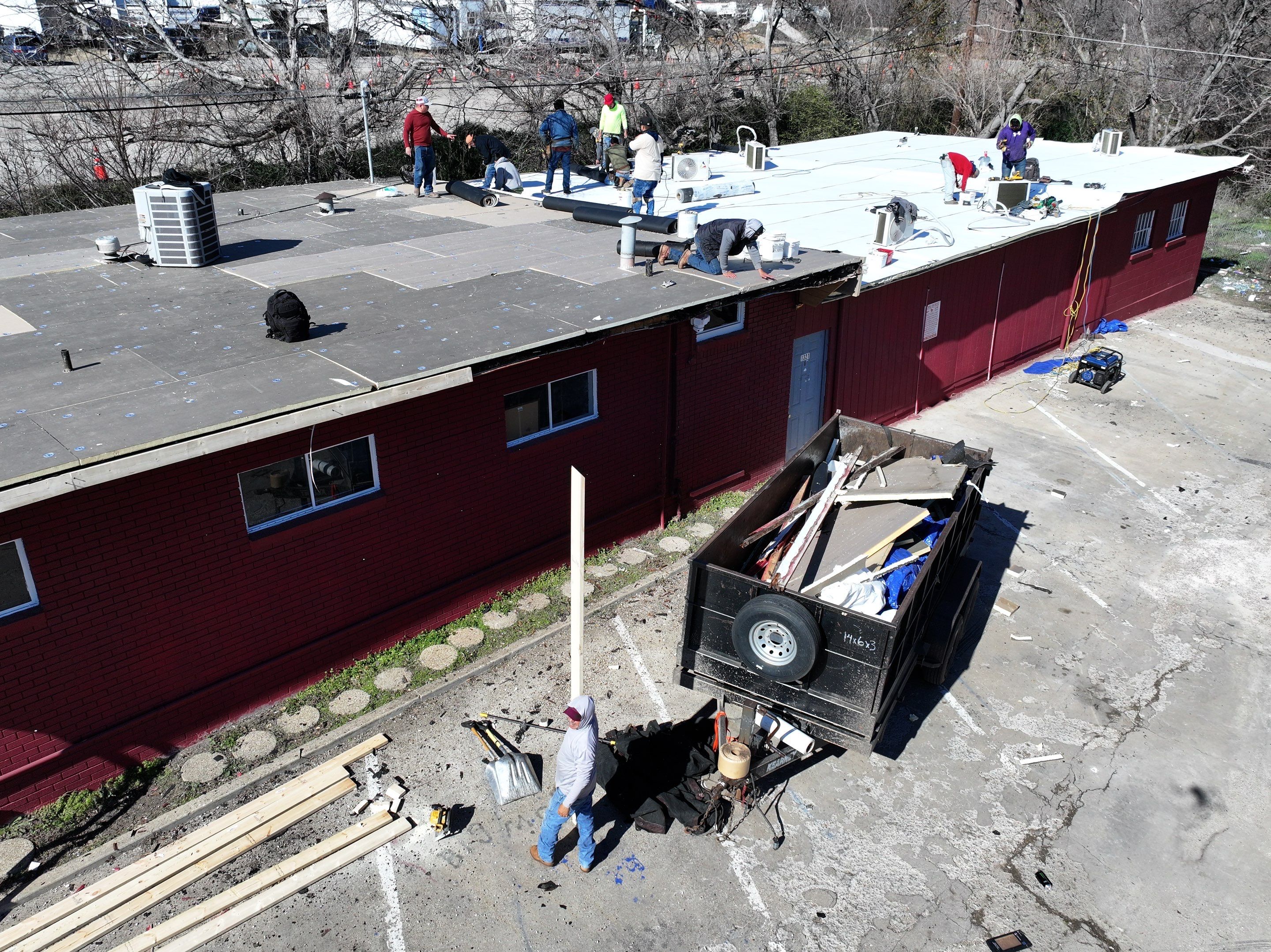 Commercial roofing overlay using GAF TPO over an old ballast roof by Becker Roofing and Exteriors