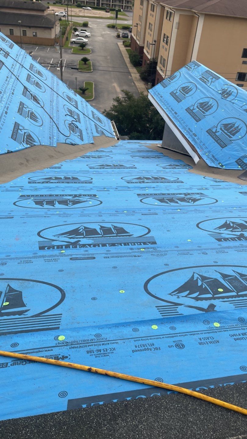 Commercial Roofing Installation using Roof Replacement by American Roofing & Construction LLC