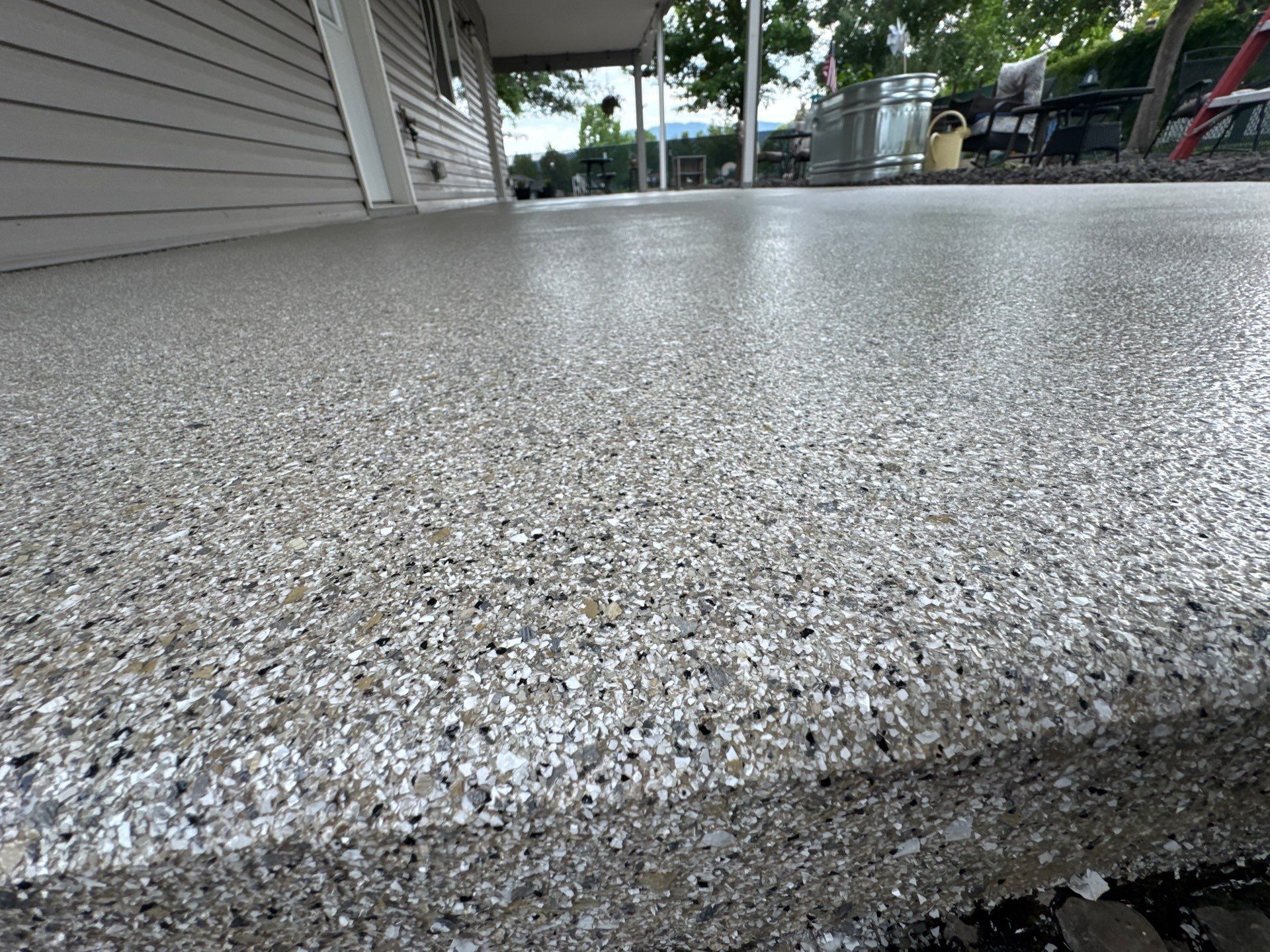 Post Falls Patio and Walkway Transformation with Quartzite Hybrid Finish by Croc Coatings, LLC