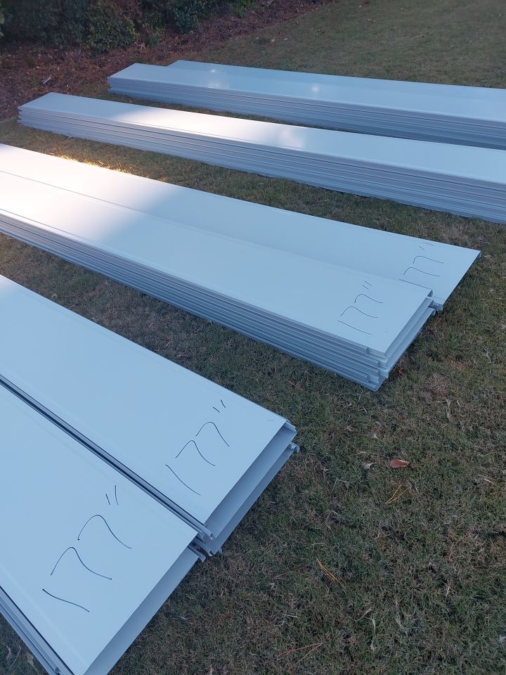 Large Metal Roof Transformation by Gallop Roofing & Remodeling, Inc.