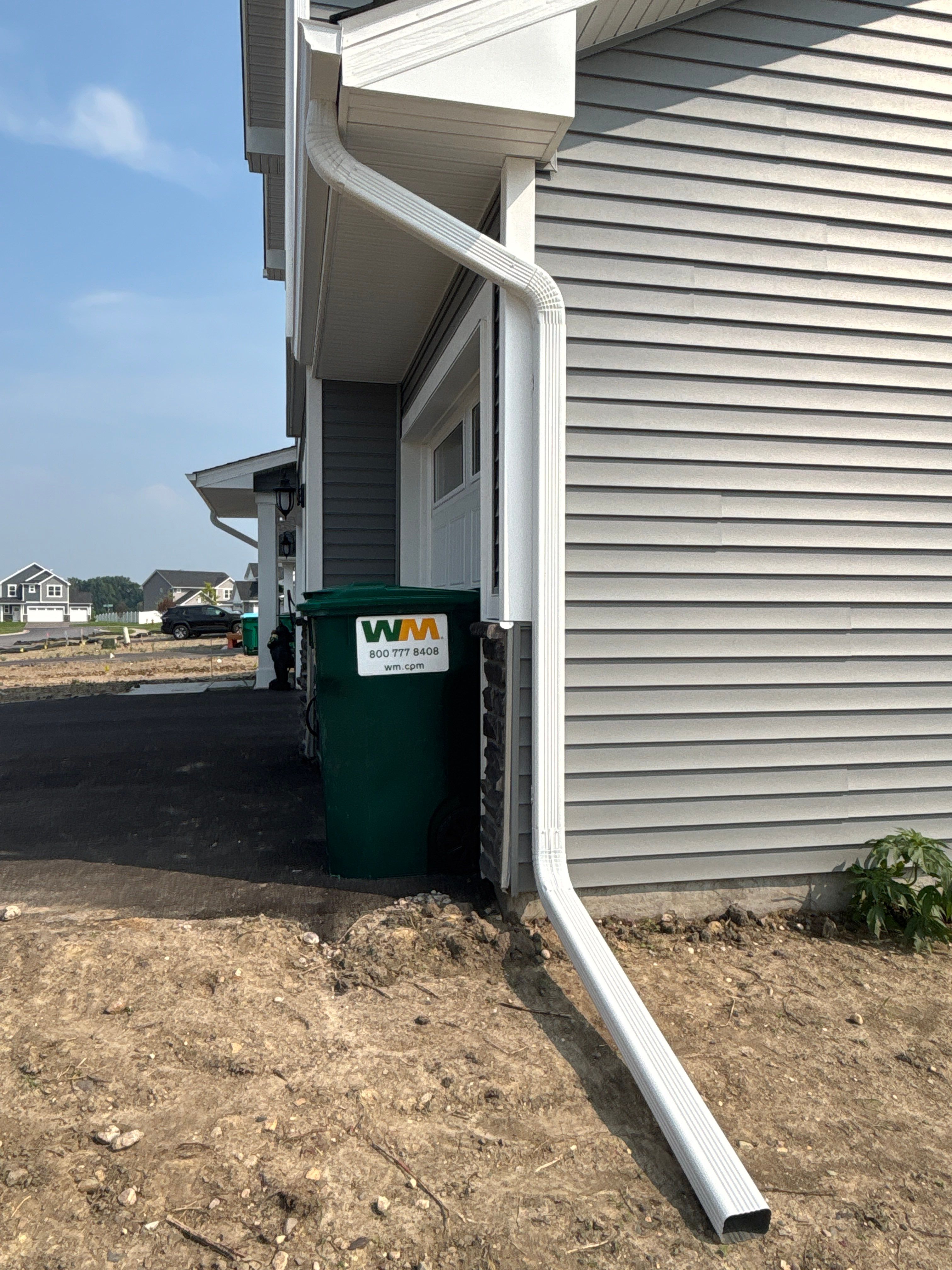 5-Inch White Seamless Gutter Installation – Otsego, MN by Next Level Seamless Gutters / Exteriors Inc.