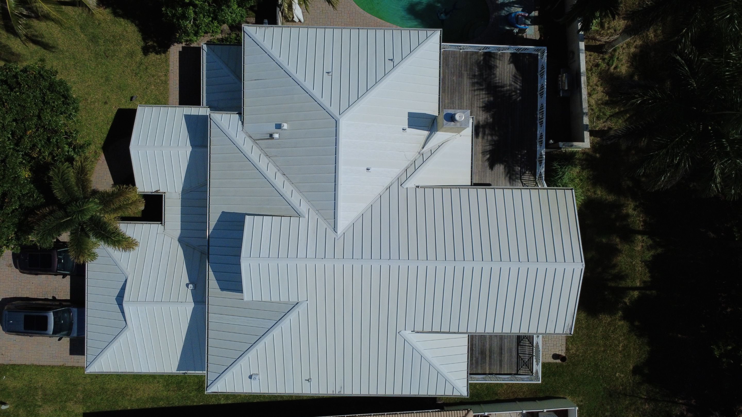 Residential Roofing Installation using 1" Nail strip metal roof by BLUES BROTHERS CONSTRUCTION CORP