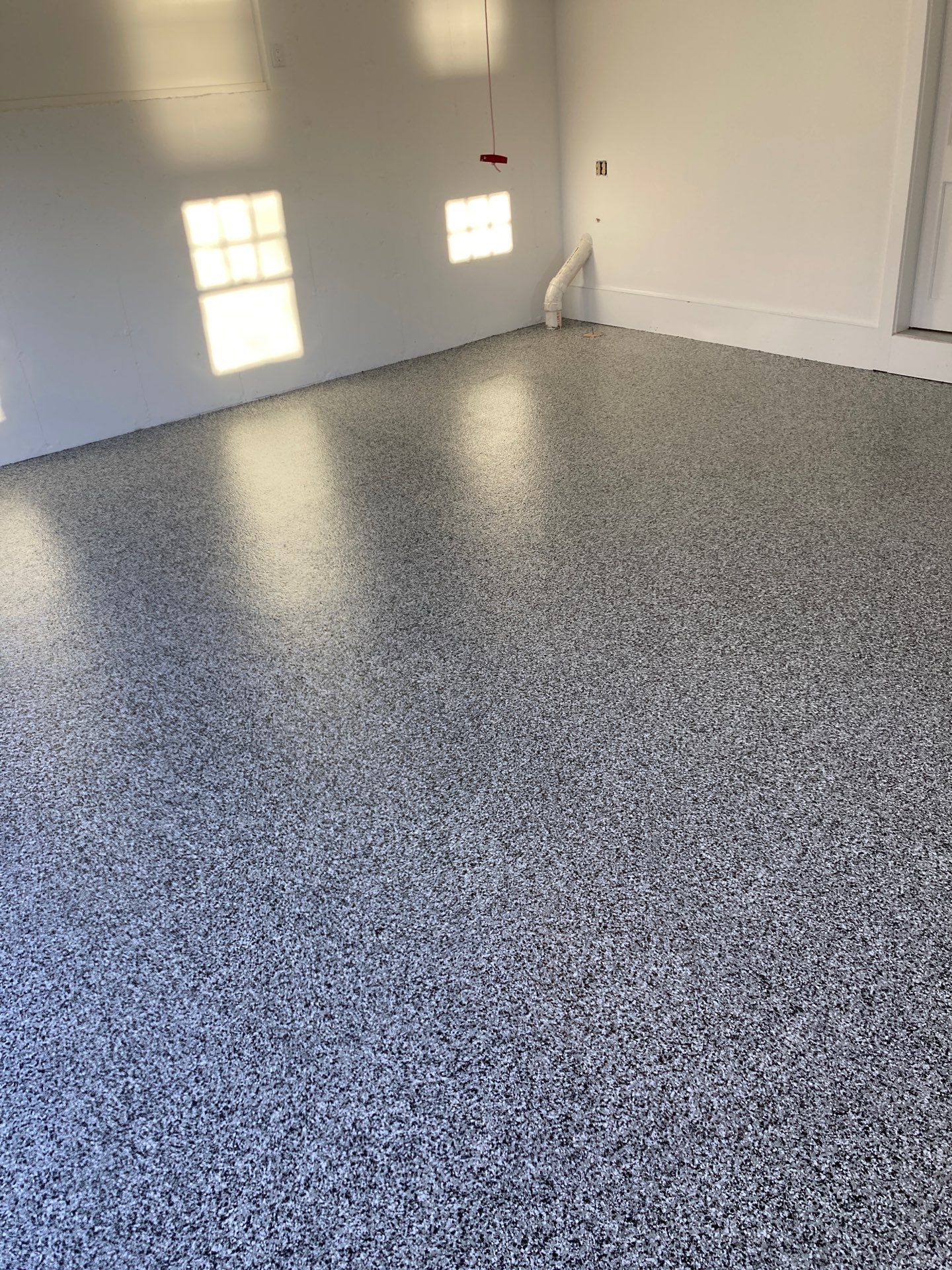 Linehan Garage TransFLOORmation by Symphony Concrete Coatings