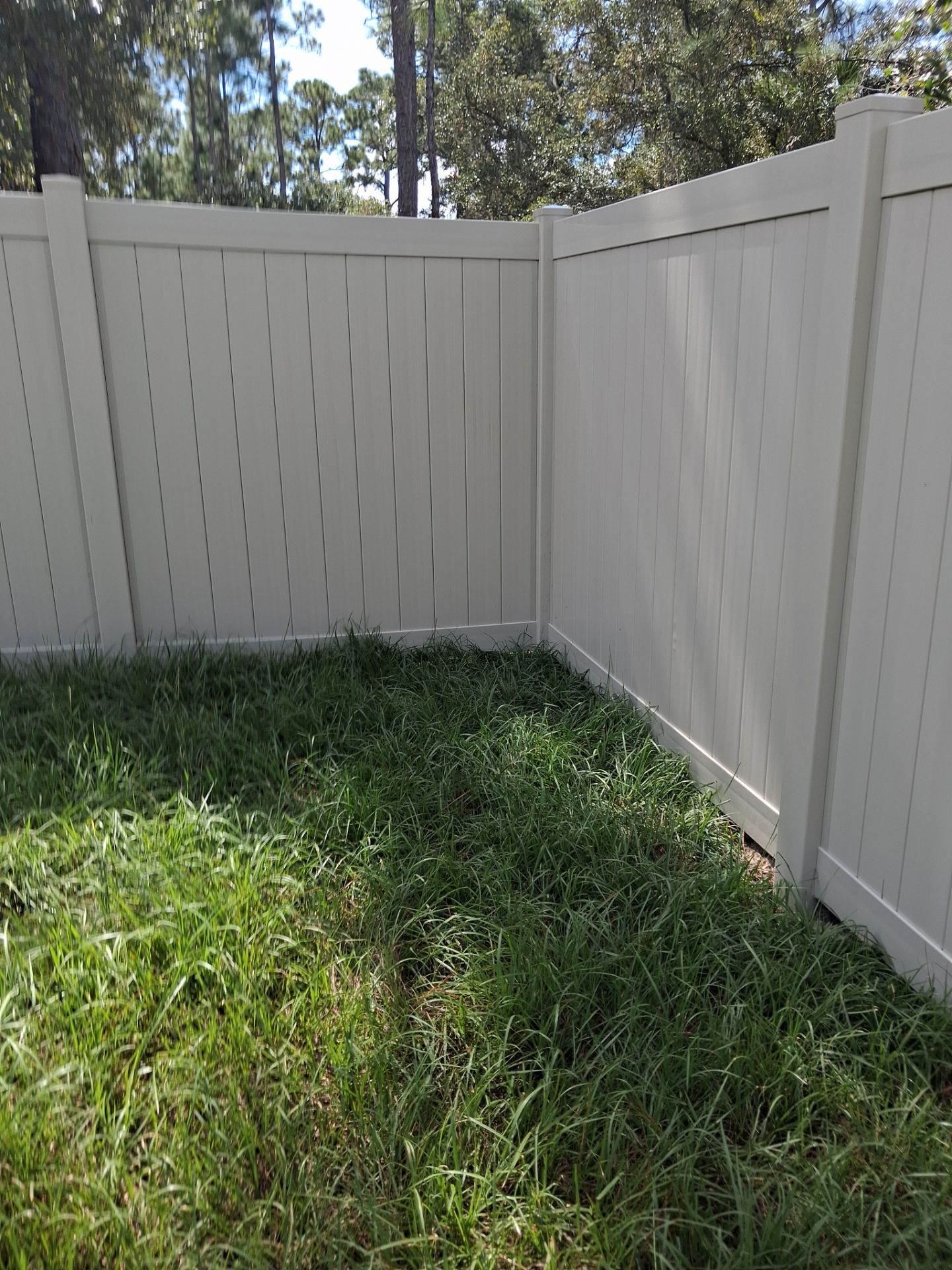 Tan Vinyl Privacy Fence and Gate Installation in Port Charlotte by True Fence LLC