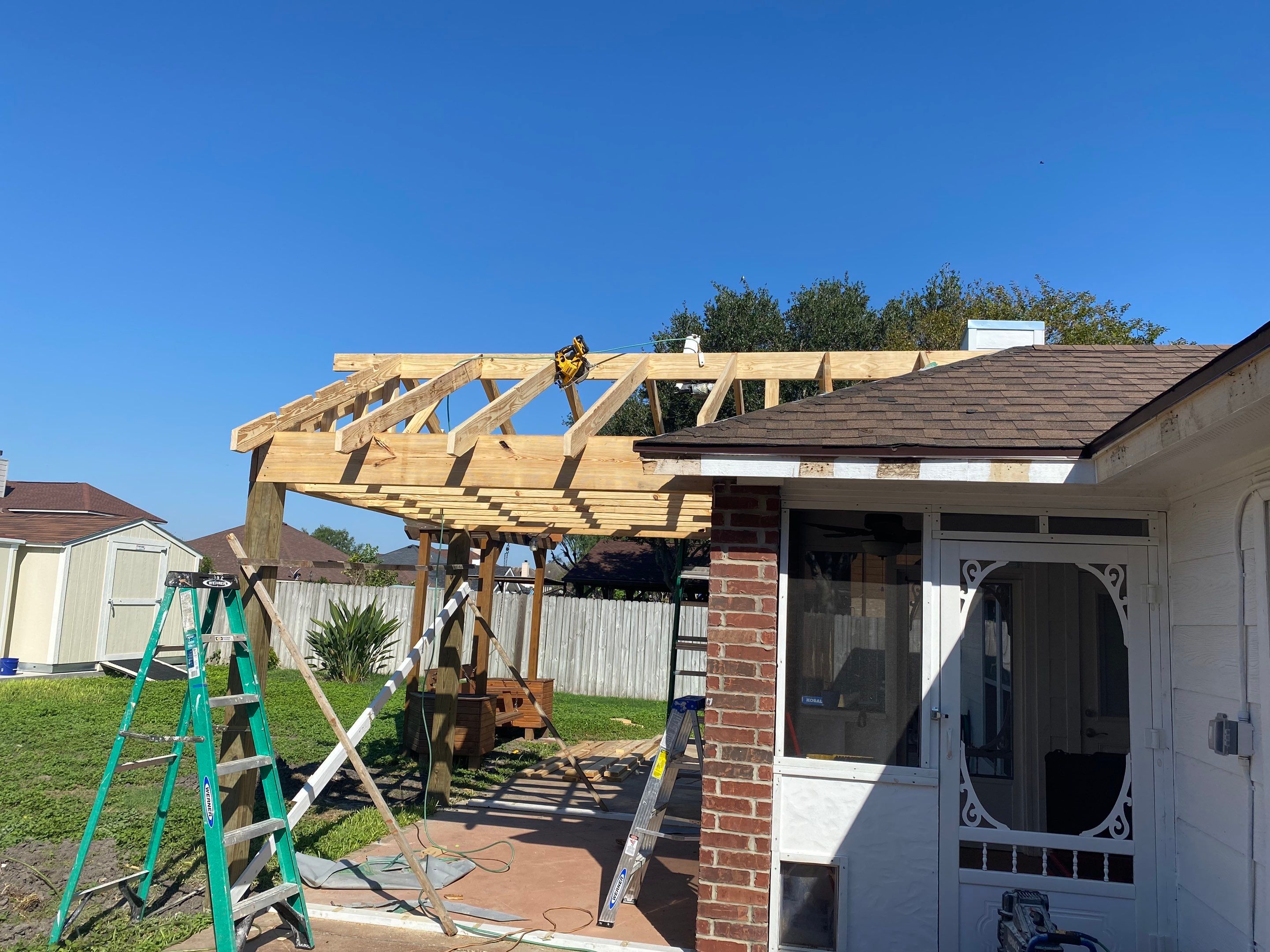 Back Yard Shade by Bayfront Roofing and Construction