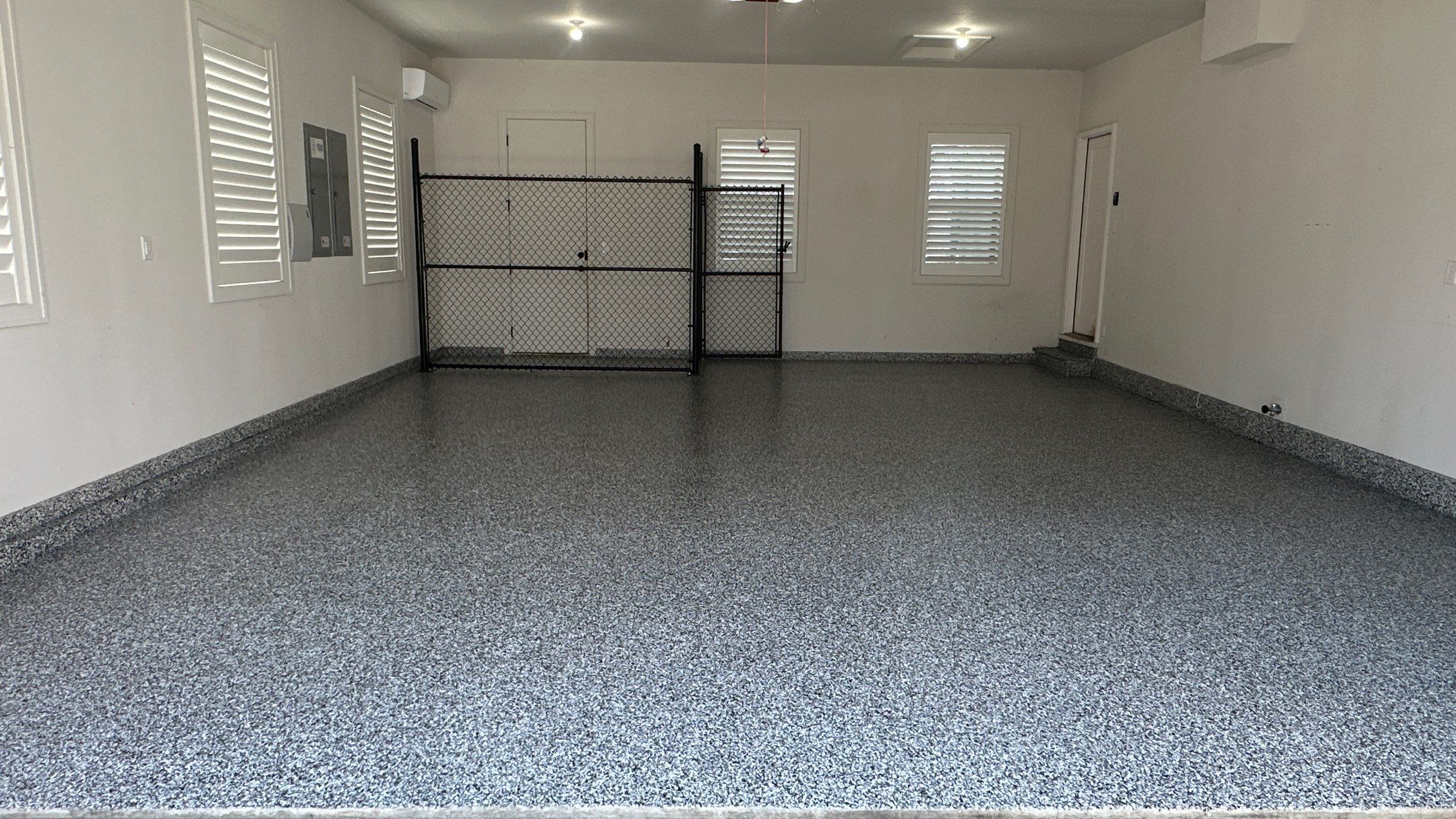 Jim E. went with a beautiful Banner Flake floor by Banner Garage
