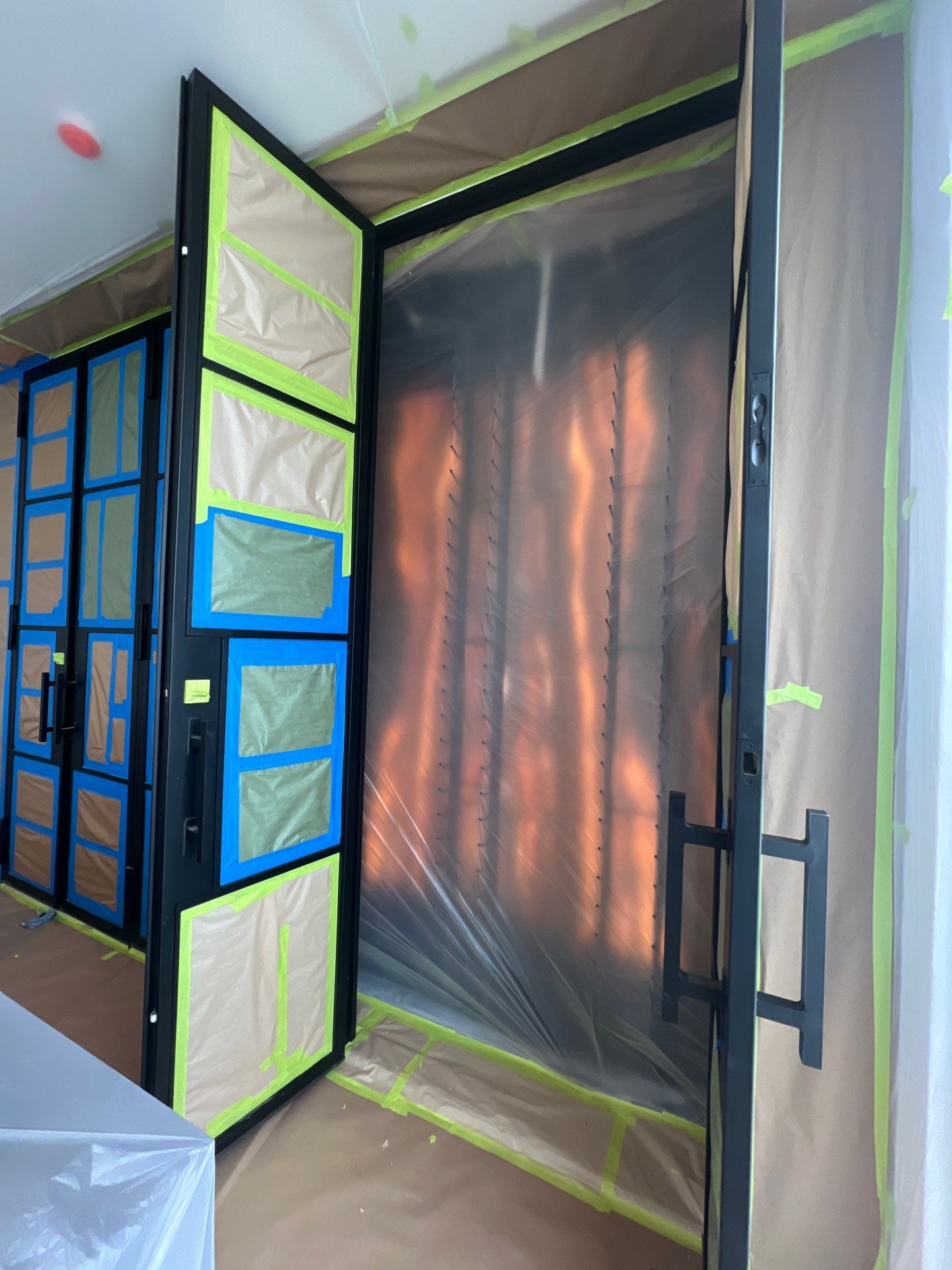 Custom Black-Framed Glass Wine Cellar Installation in Dallas by Solara Custom Living