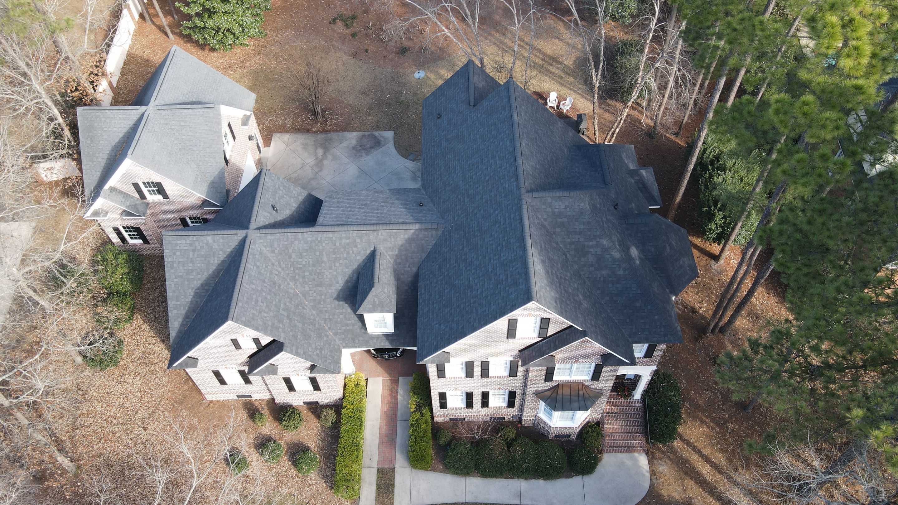 Residential Roofing Installation using Owens Corning Duration Williamsbur Gray by Indigo State Roofing