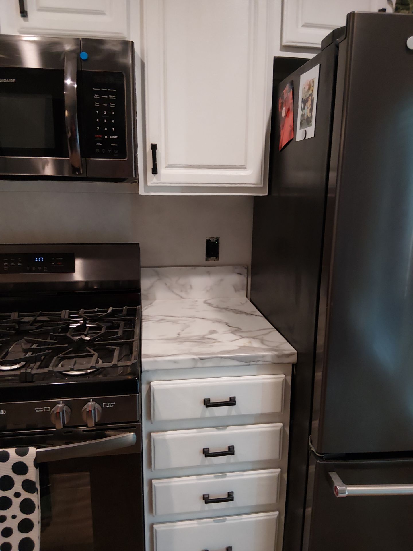 Kitchen Refresh and Hardwood Floor Restoration in Clayton by Legendary Services Company LLC.