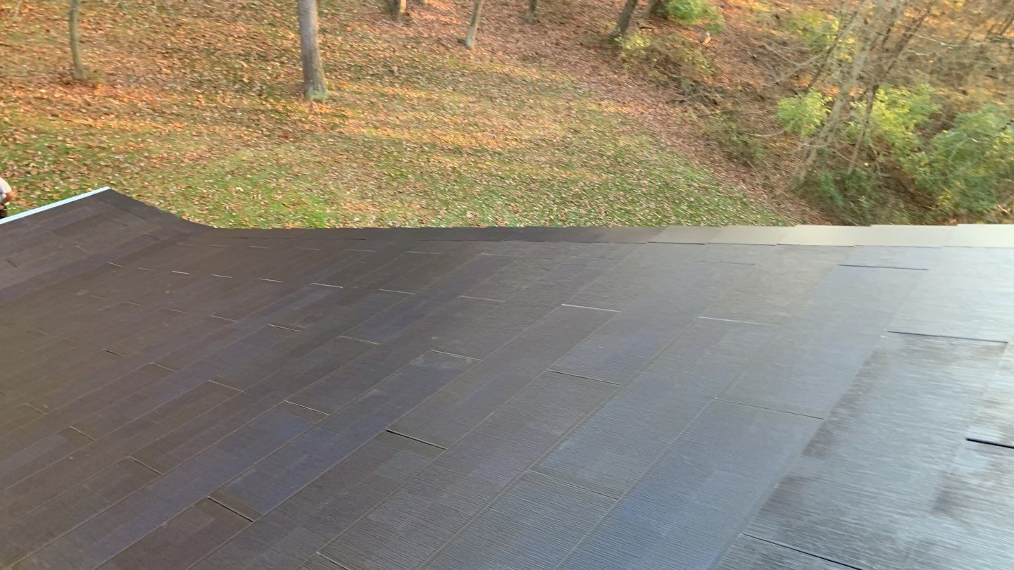 Tesla Solar Roof Replacement by American Home Contractors