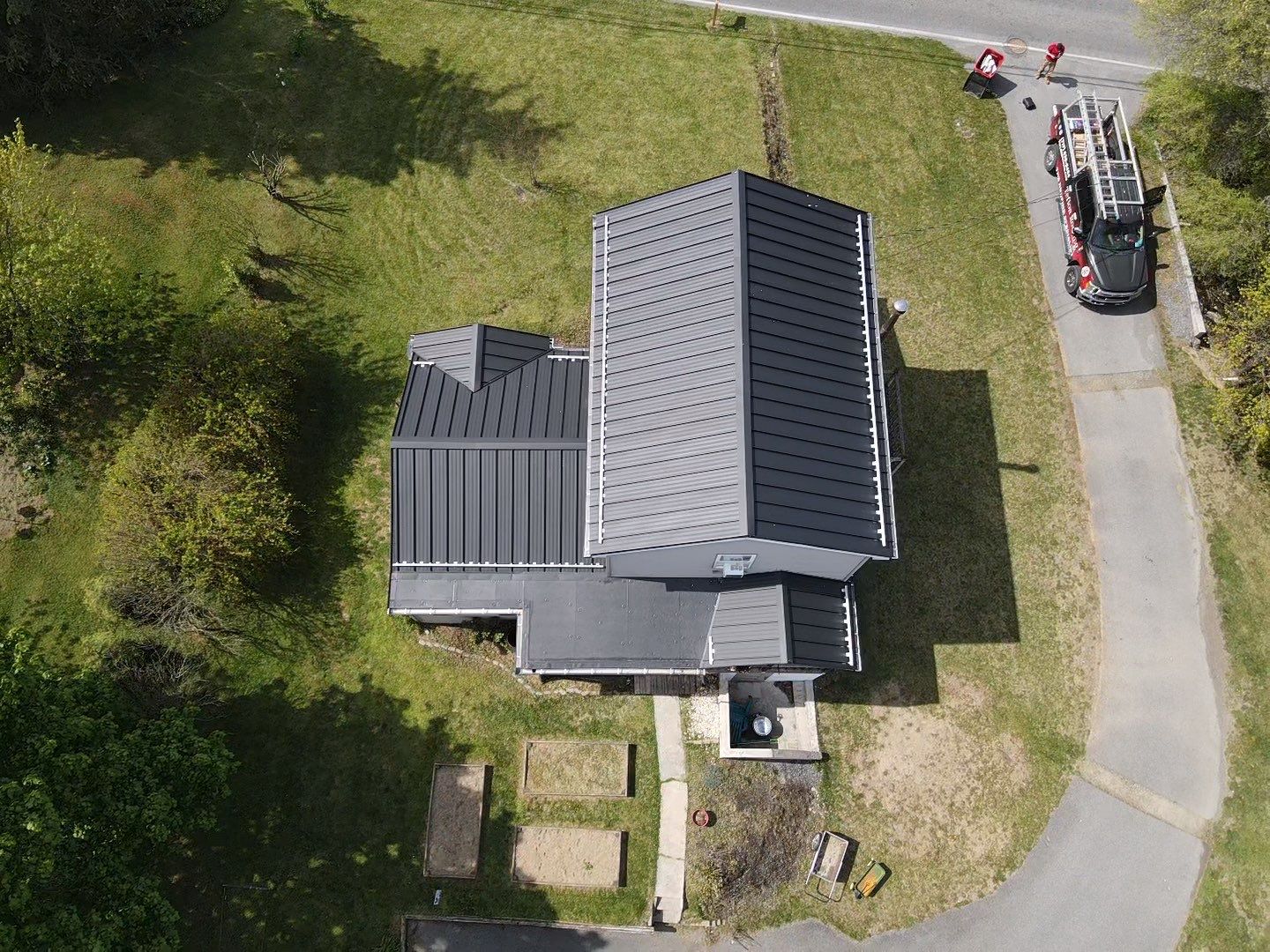 Residential Roofing Installation using Texture Standing Seam by Teflon Roofing