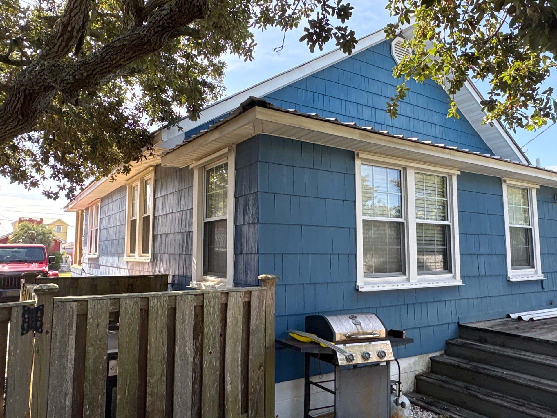 Dark Blue Board and Batten Siding Replacement in Kure Beach by Ideal Siding Wilmington, NC