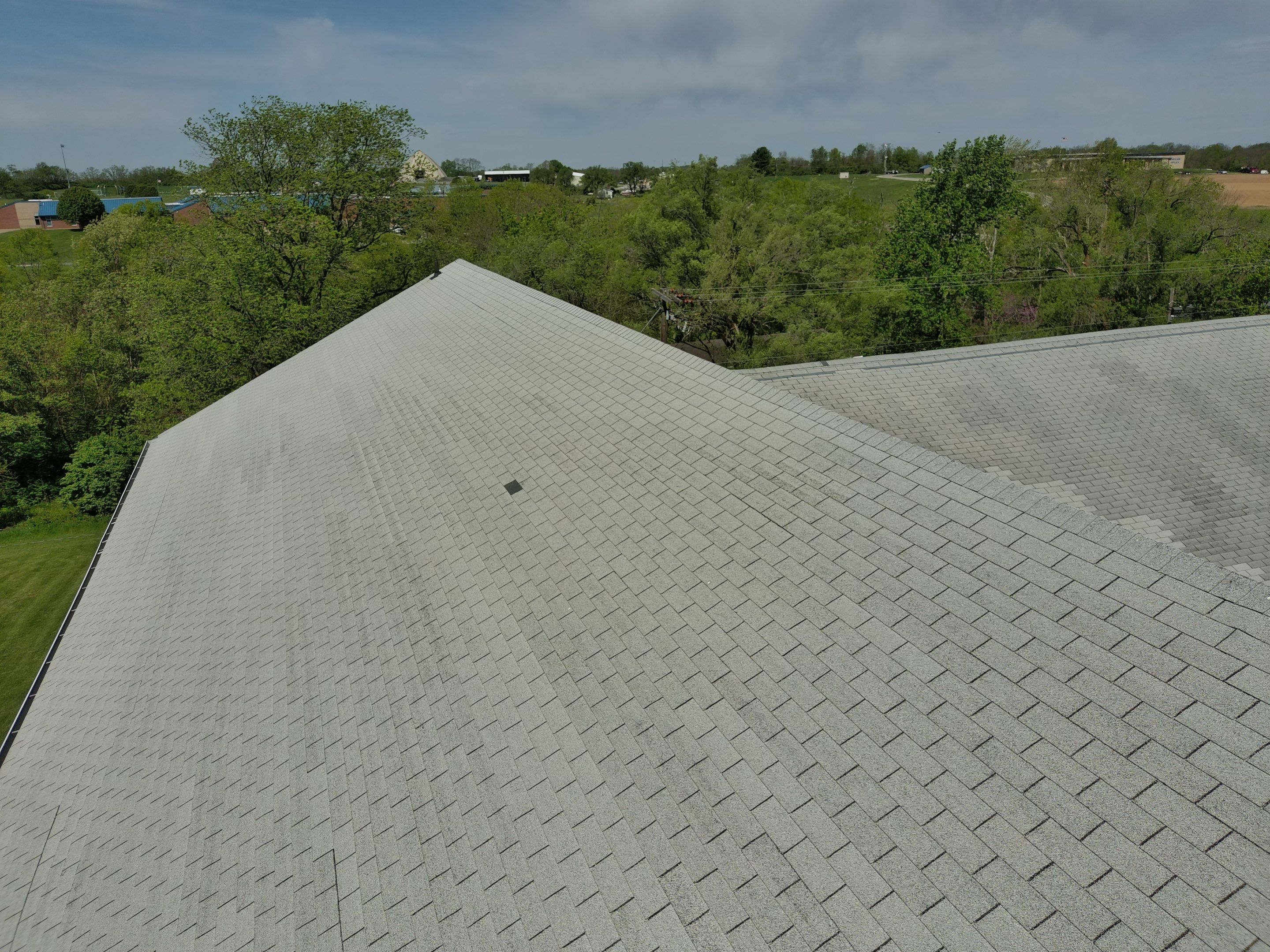 Commercial Roofing Installation using Performance Shingles by Mr. Roofer
