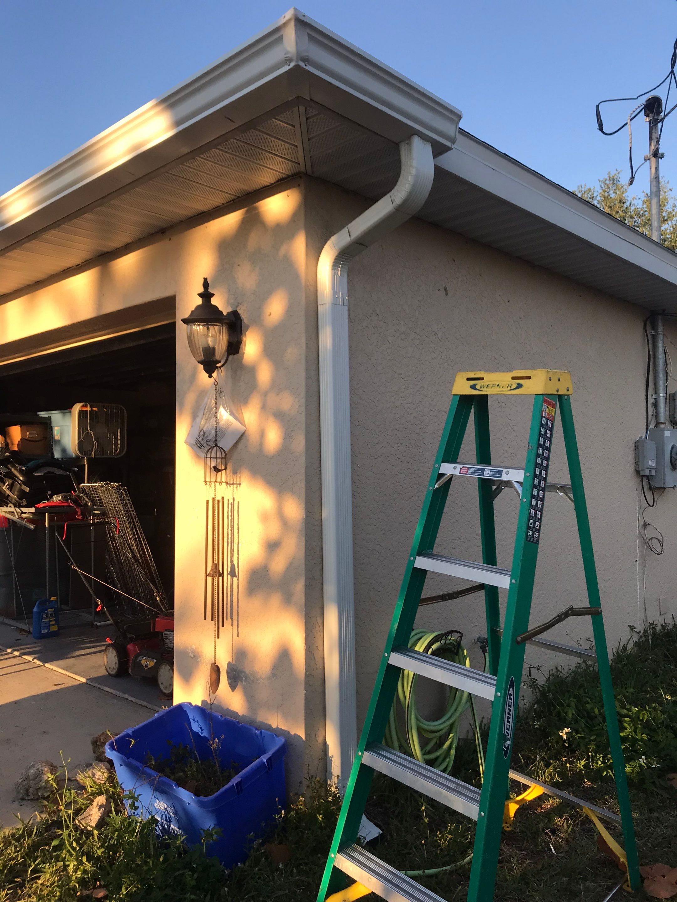 White Seamless Gutters and Soffit Installation in Cape Coral FL by Gutter Professors