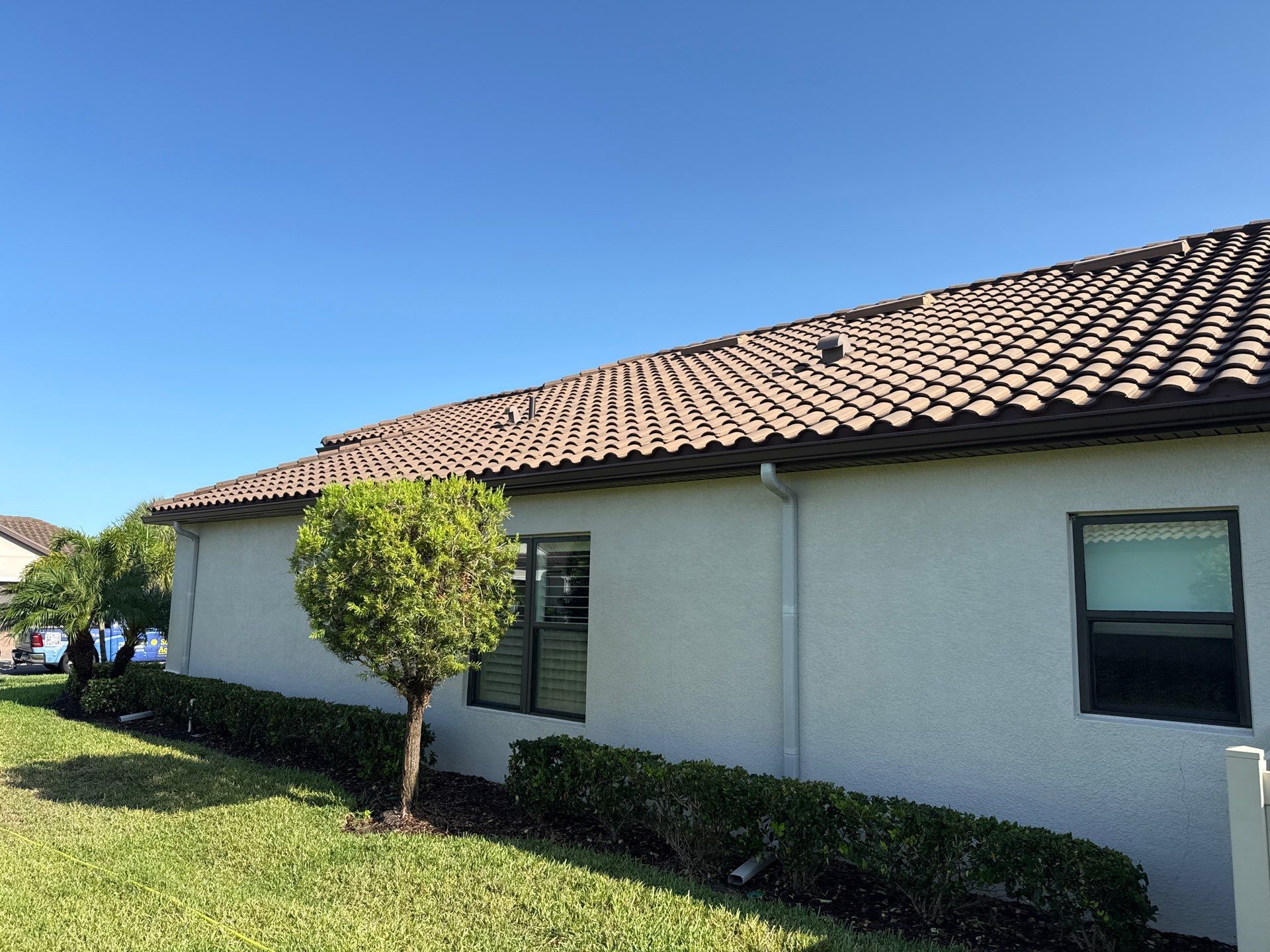 Concrete Tile Roof, Paver Driveway & Lanai Cleaning – Artisan Lakes Esplanade, Palmetto, FL by Sunshine AquaWash