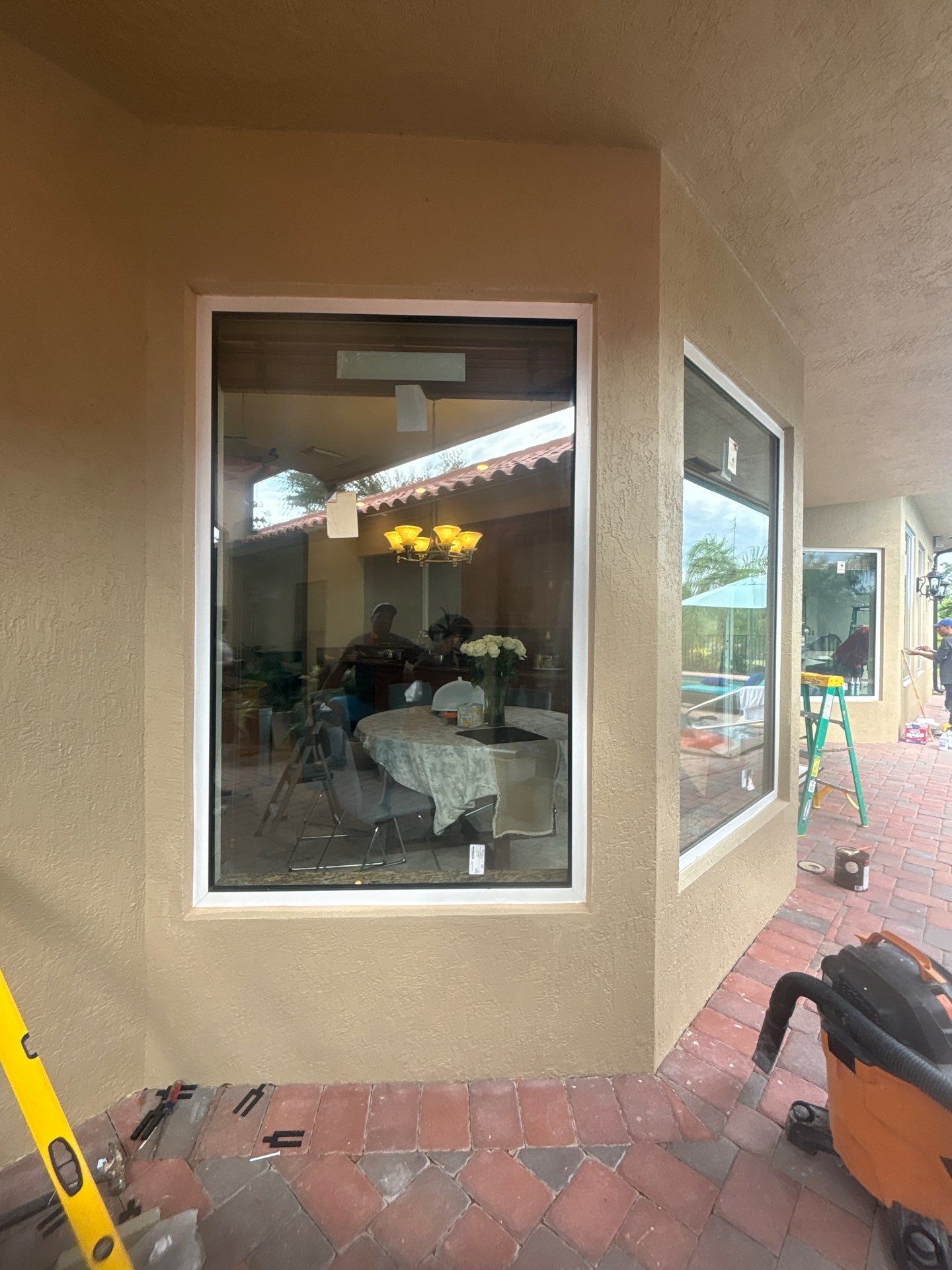 PGT Black pocket doors and Euro-Wall storefront & SGD by Windows For Life 