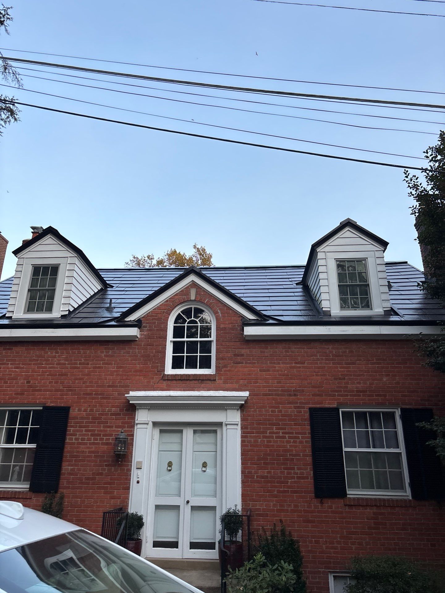 Sleek Tesla Solar Roof + Powerwall Installation | Alexandria, VA by American Home Contractors