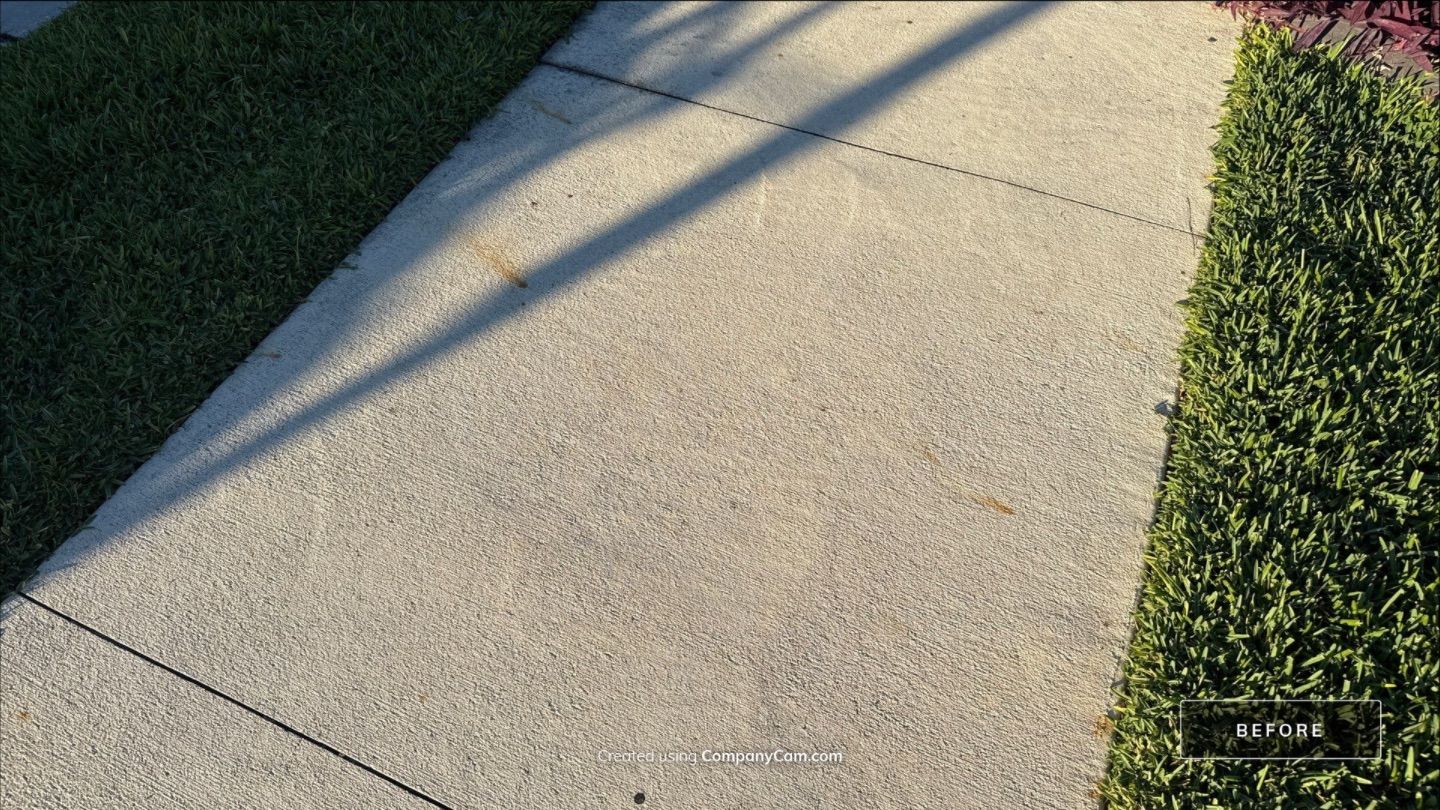 Rust Stain Removal from Concrete Driveway and Pavers in Park East at Azario | Lakewood Ranch, FL by Sunshine AquaWash