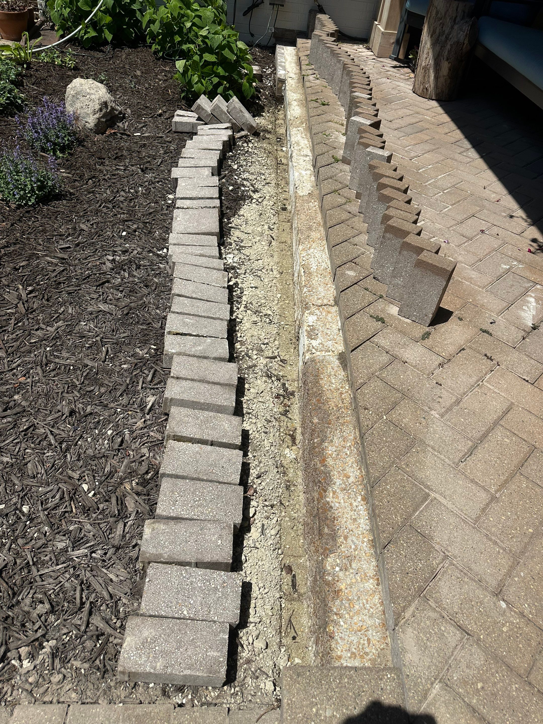 Brick paver repair, cleaning and sealing by Northern Power Washing LLC.