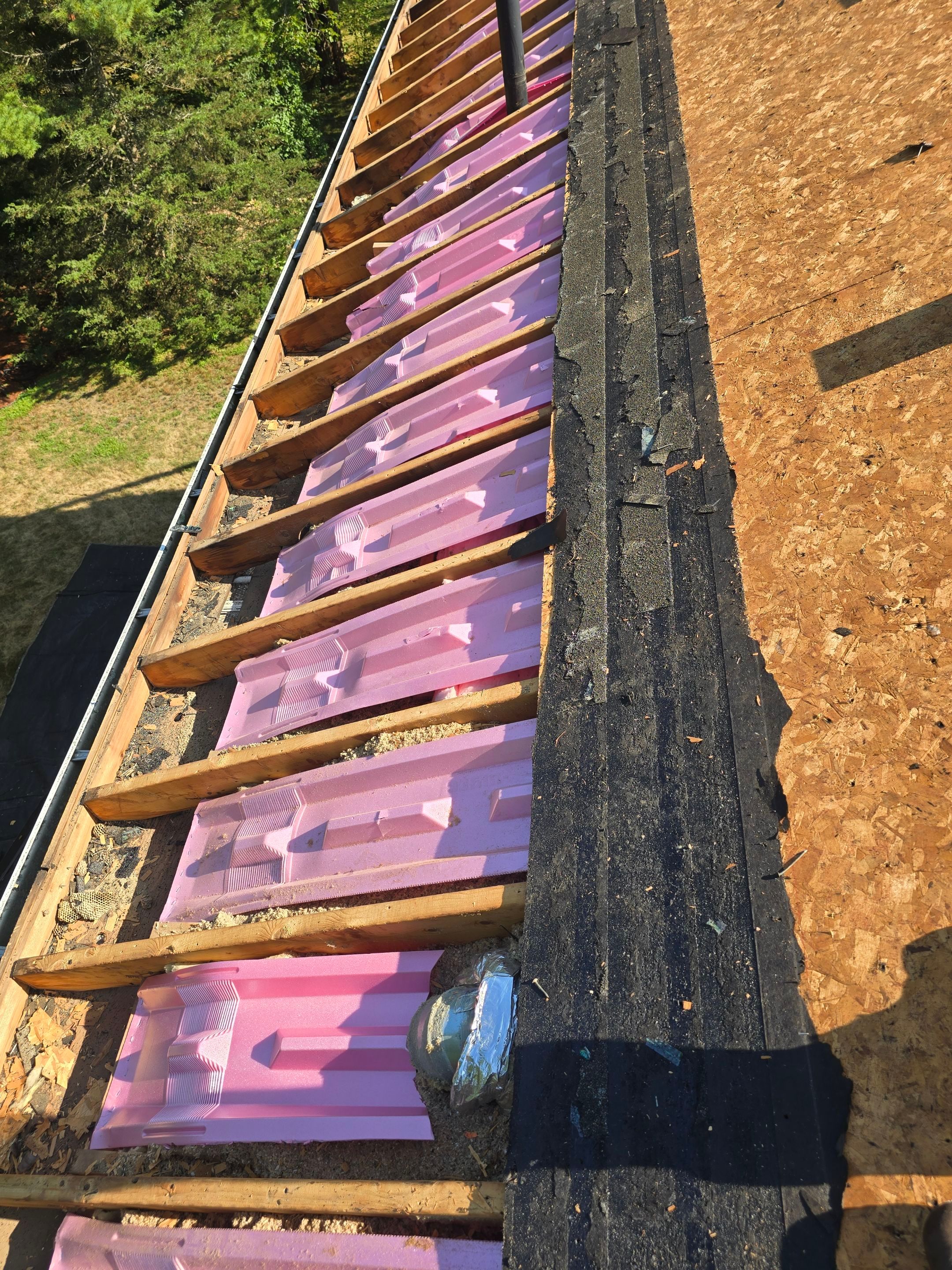 Complete Roof Replacement with Chimney Flashing, Gutter Guard System, and Vinyl Siding Repairs by Mighty Dog Roofing of Greater Middlesex County
