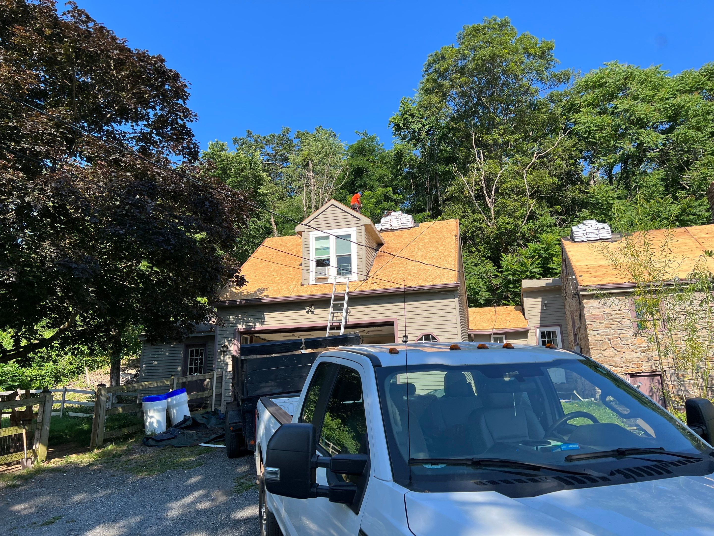 Residential Roofing Installation using Atlas Pinnacle Pristine Black Architectural Shingles by Frederick Roof Repair