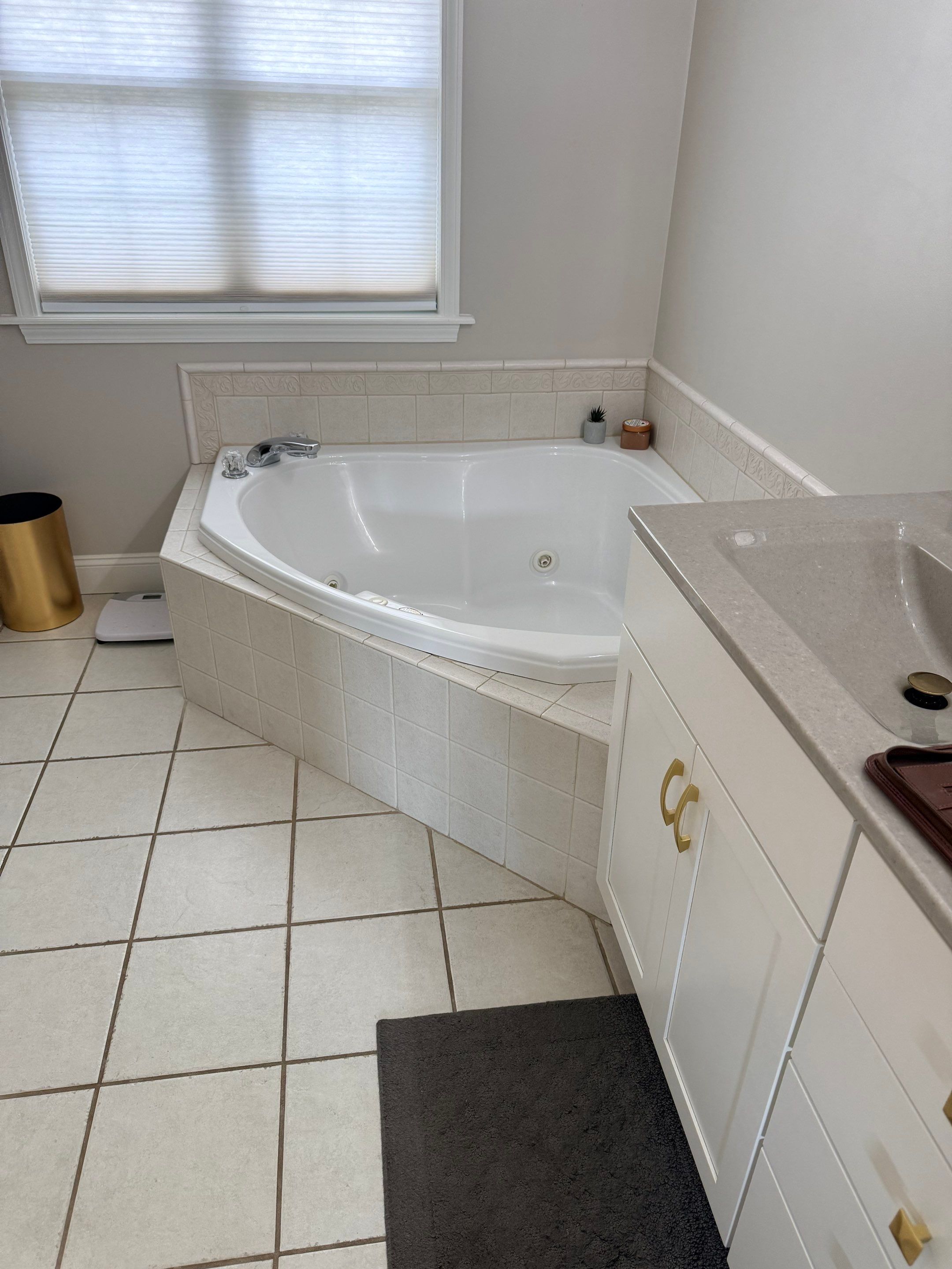 Master Bathroom Renovation Featuring Dark Textured Shower Panels in Branson West by Kitchen Works LLC