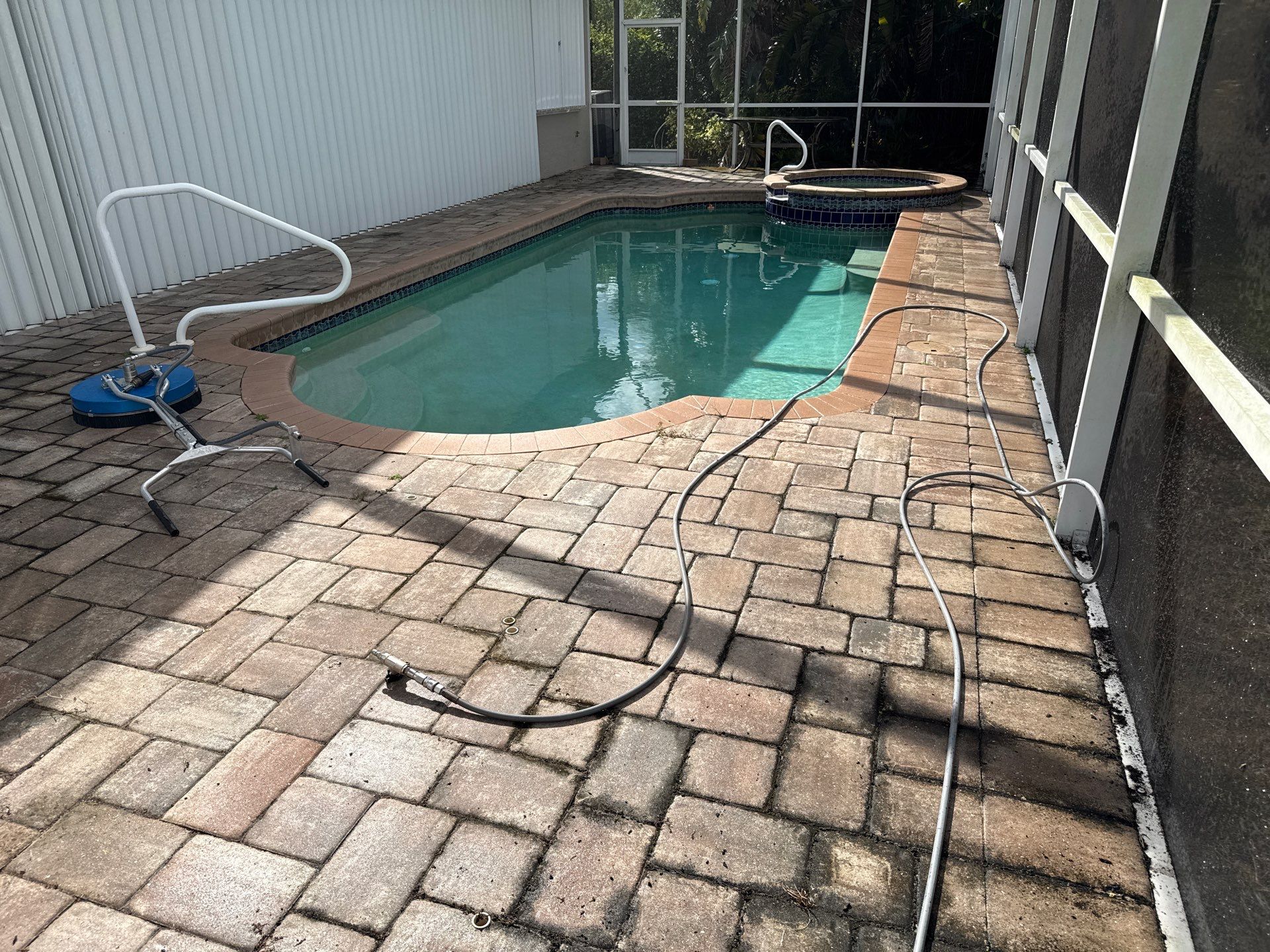 Paver Pool Deck & Screen Enclosure Transformation | University Park, Sarasota FL by Sunshine AquaWash