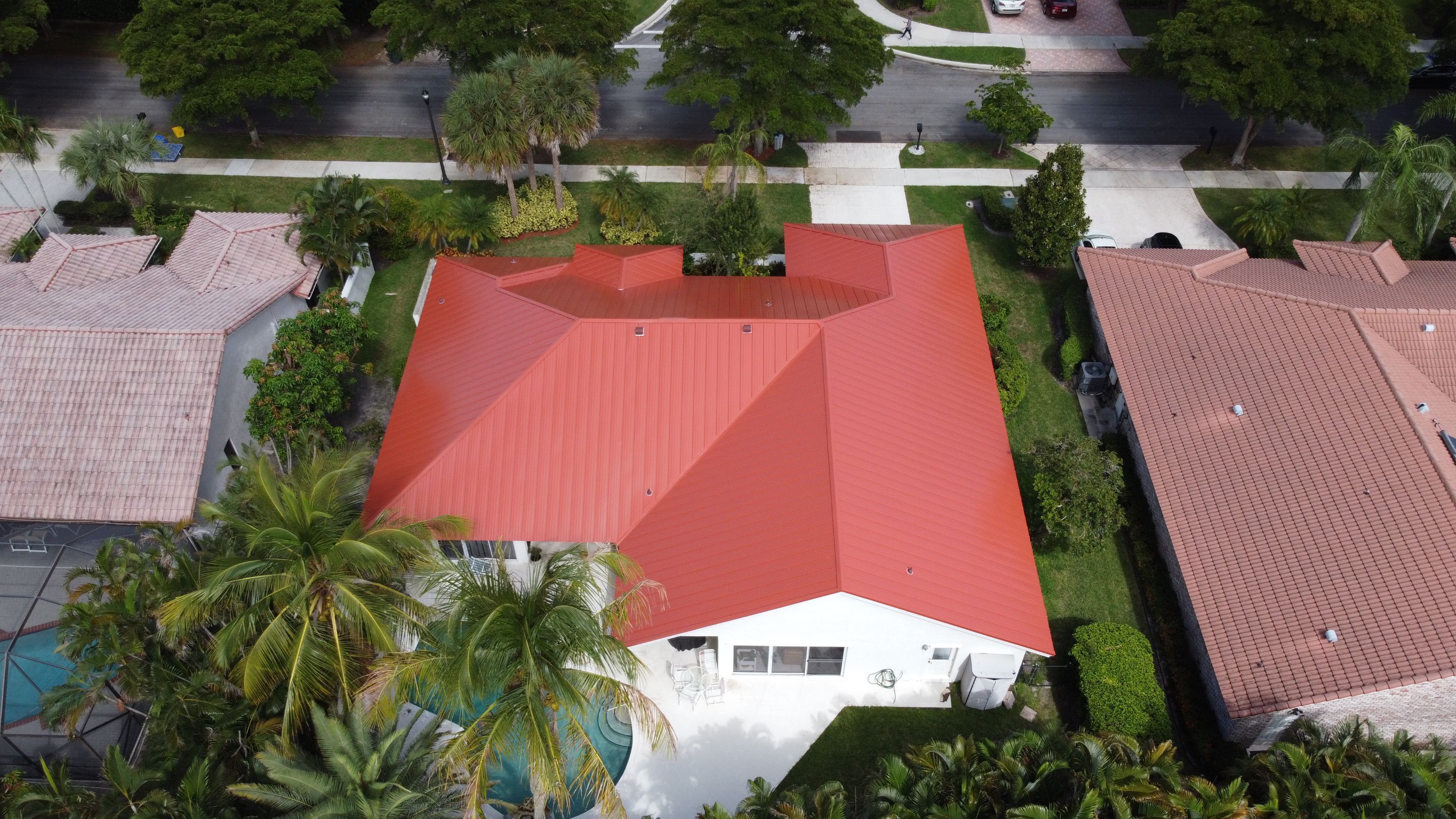 Residential Roofing Installation using 1" Nail strip metal roof by BLUES BROTHERS CONSTRUCTION CORP