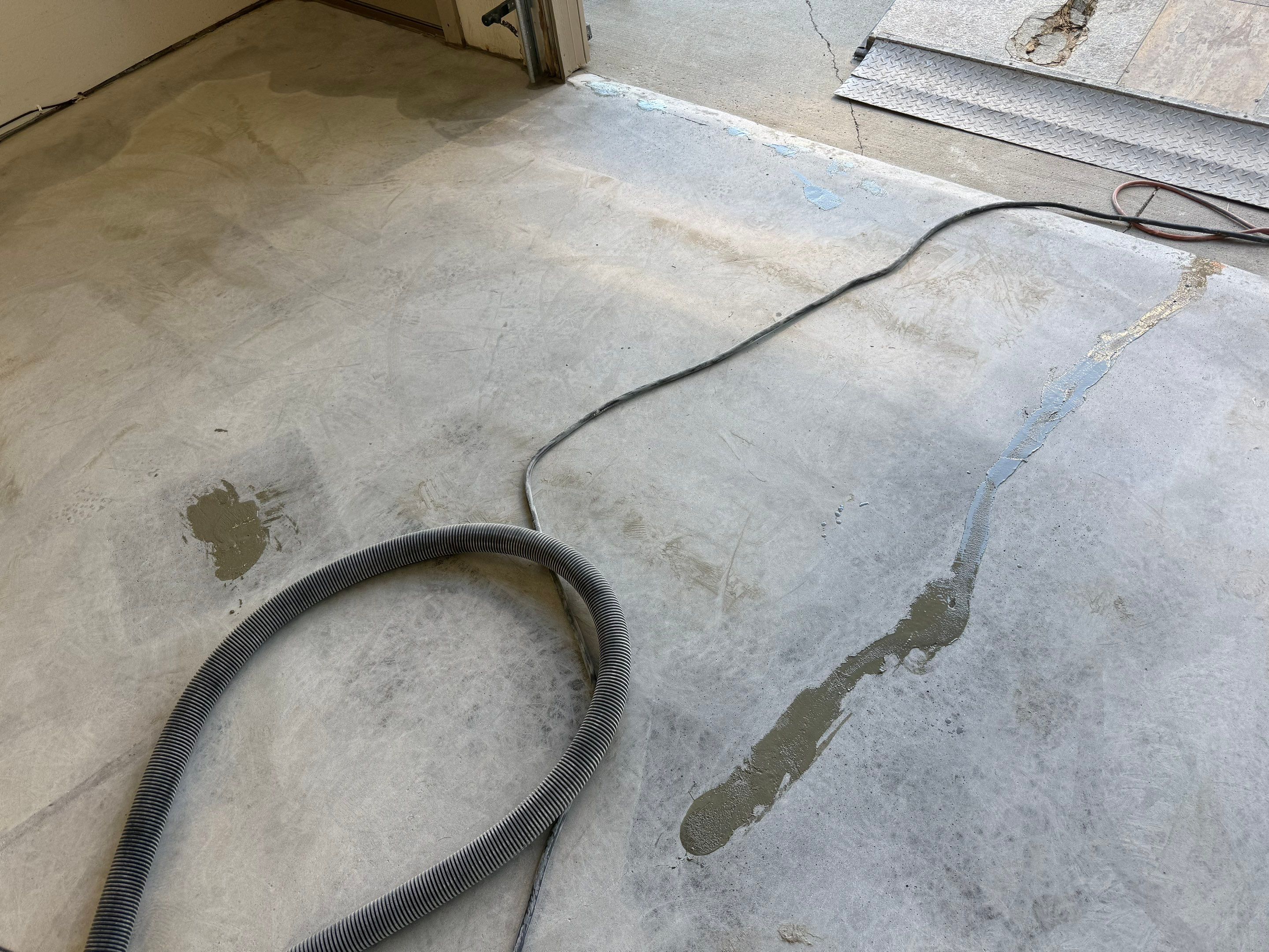 Smoke Flake Garage Floor Coating in Dell Rapids by Select Painting, Coatings & Garage Cabinets