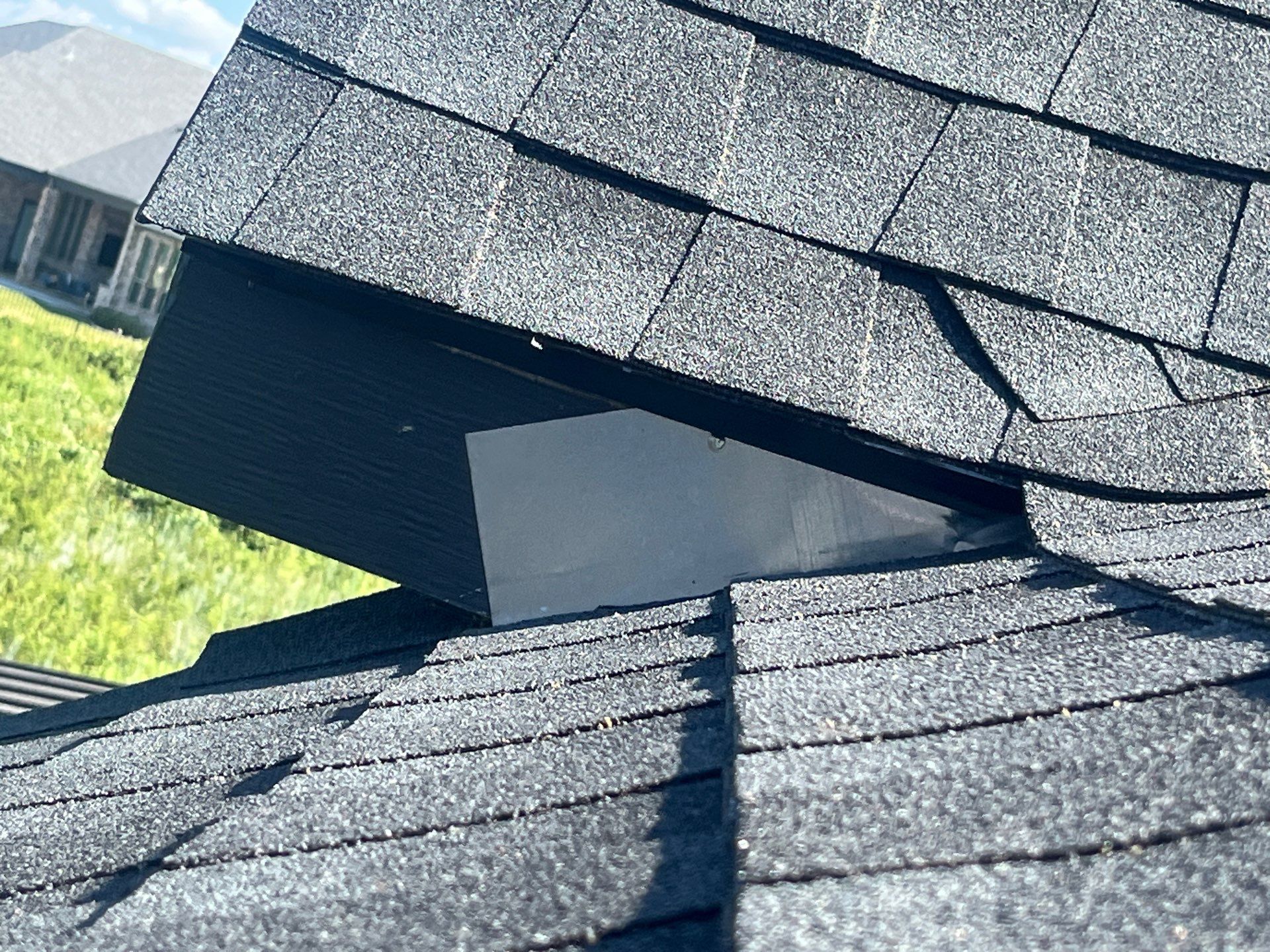 GAF-Charcoal with White Brick  by Tejas Roofworks + Restoration